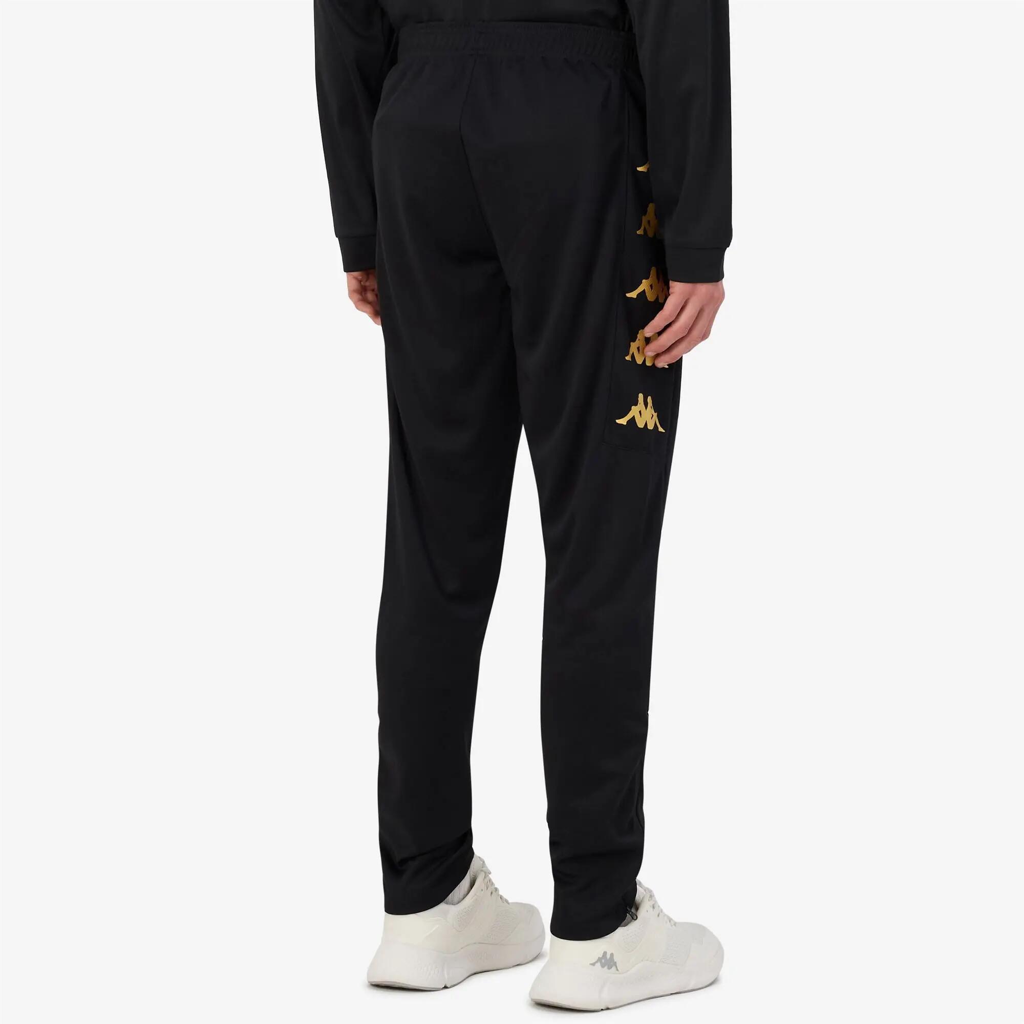 Pantaloni tuta da bambino in poliestere nero da calcio 6/7