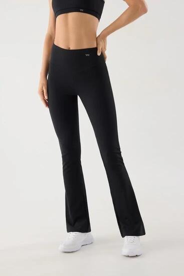 Legging sport femme vert évasé toucher coton