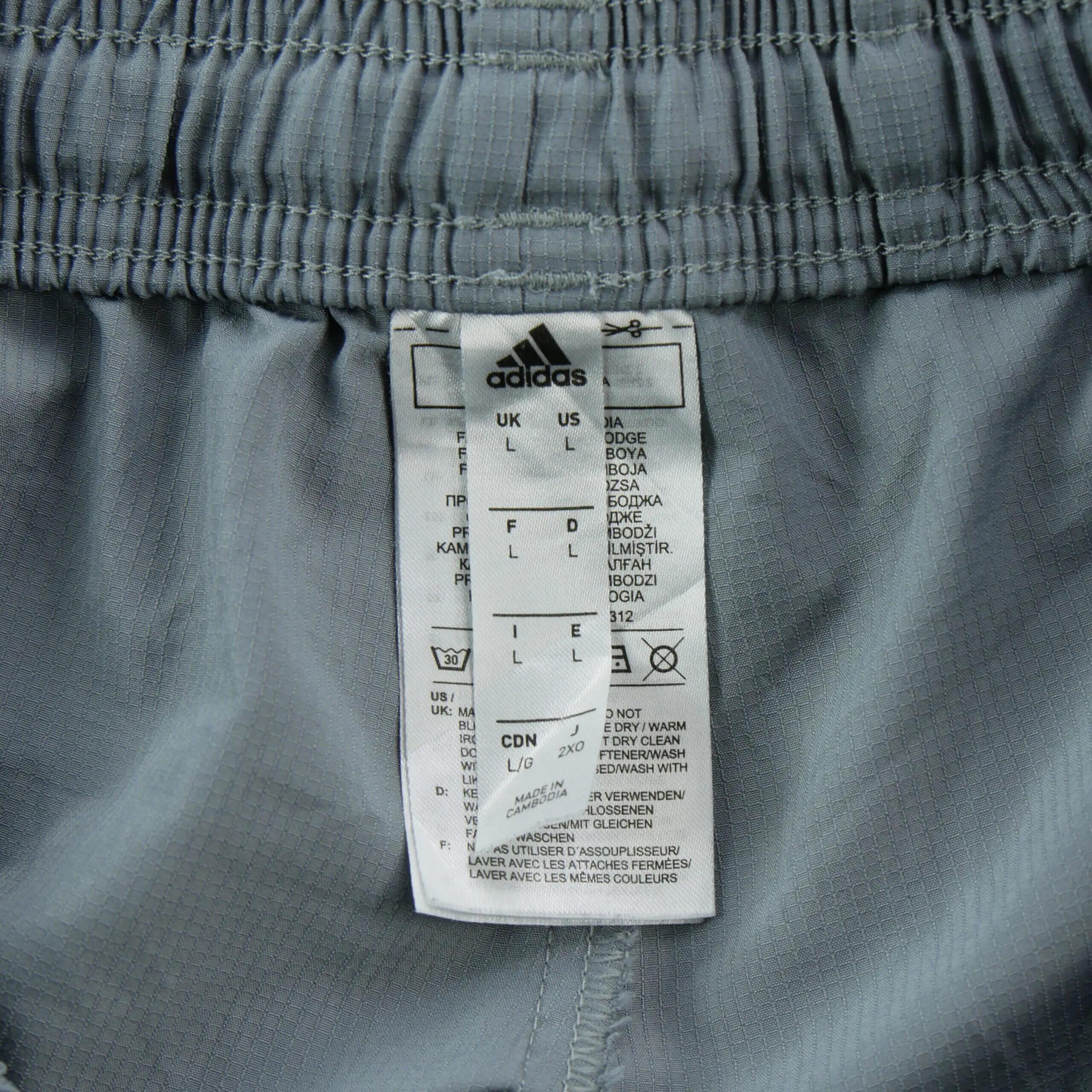 Seconde vie - Jogging Homme Tiro 19 Woven Pants Gris - Bon état 9/12
