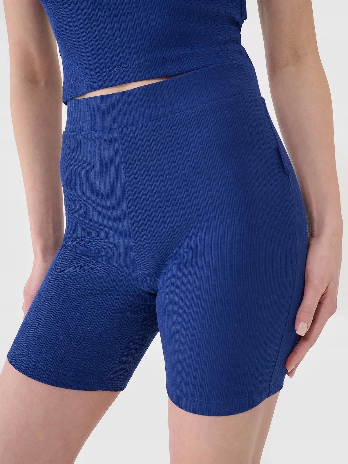 4F LEGGINSY DAMSKIE KRÓTKIE KOLARKI DZIANINOWE KRÓTKIE KOLOR WIELOKOLOROWE 9/10
