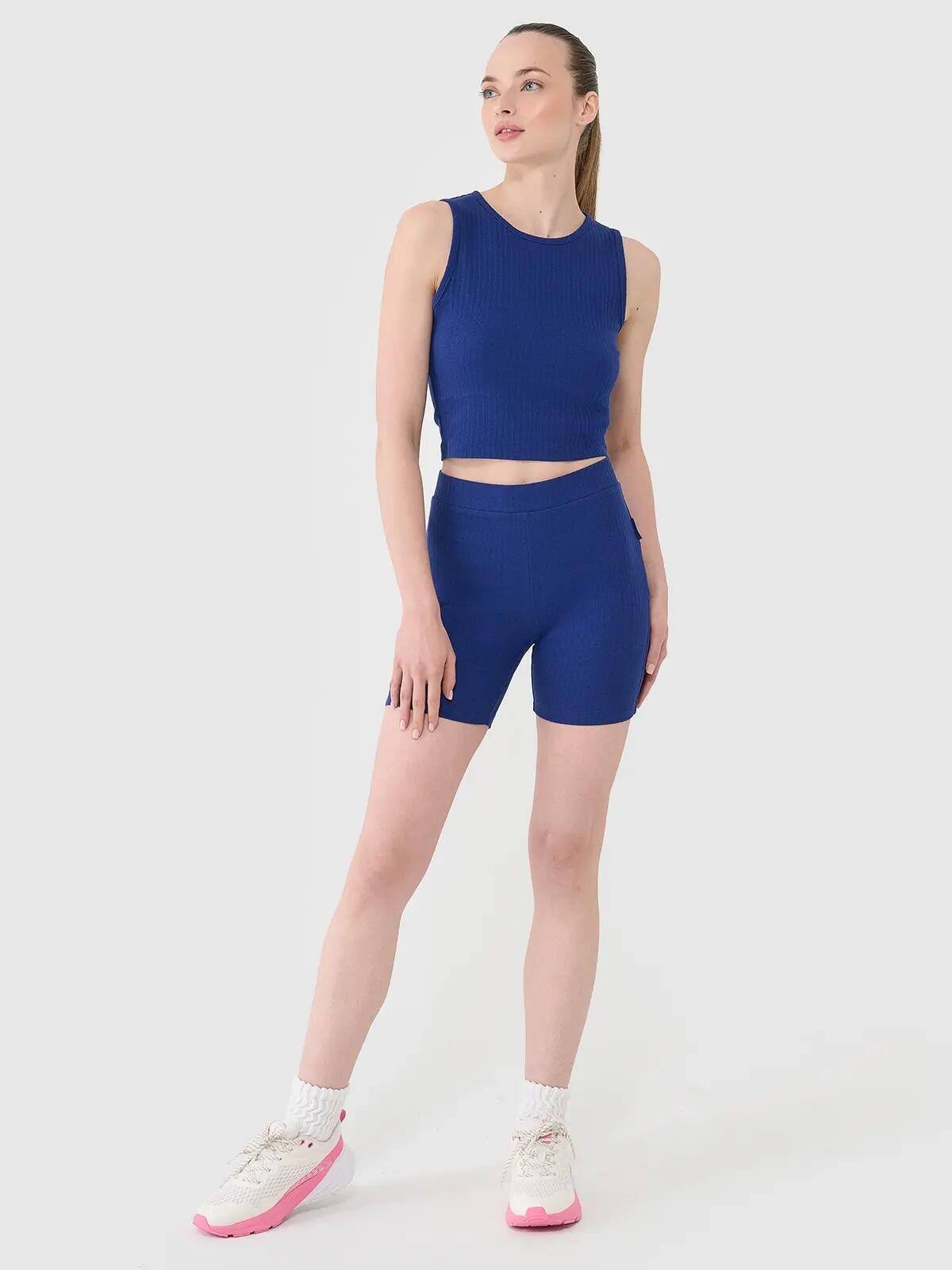 4F LEGGINSY DAMSKIE KRÓTKIE KOLARKI DZIANINOWE KRÓTKIE KOLOR WIELOKOLOROWE 2/10