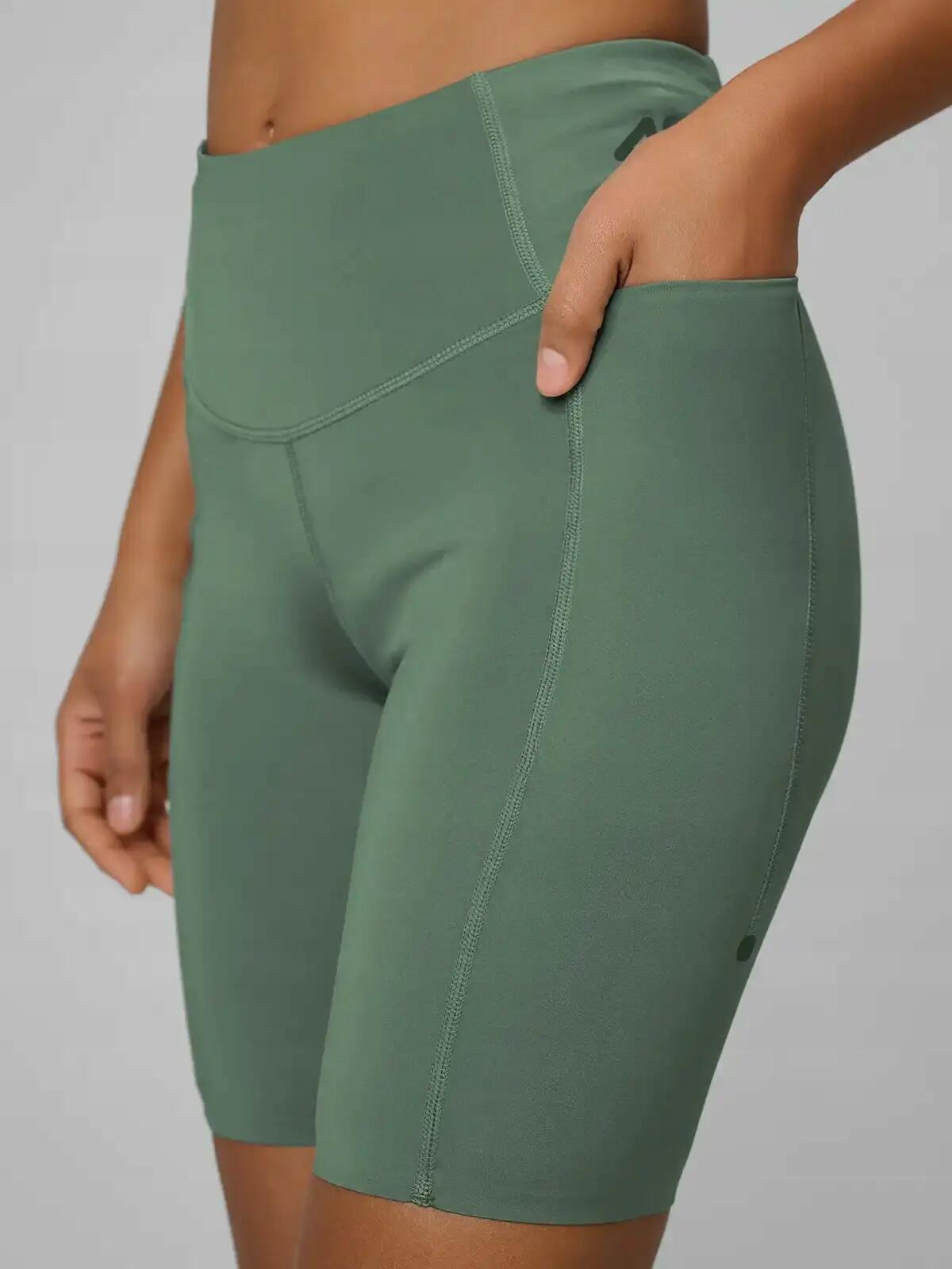 LEGGINSY DAMSKIE 4F KRÓTKIE KOLARKI SZYBKOSCHNĄCE  PRZED KOLANO KOLOR ZIELONY 2/13