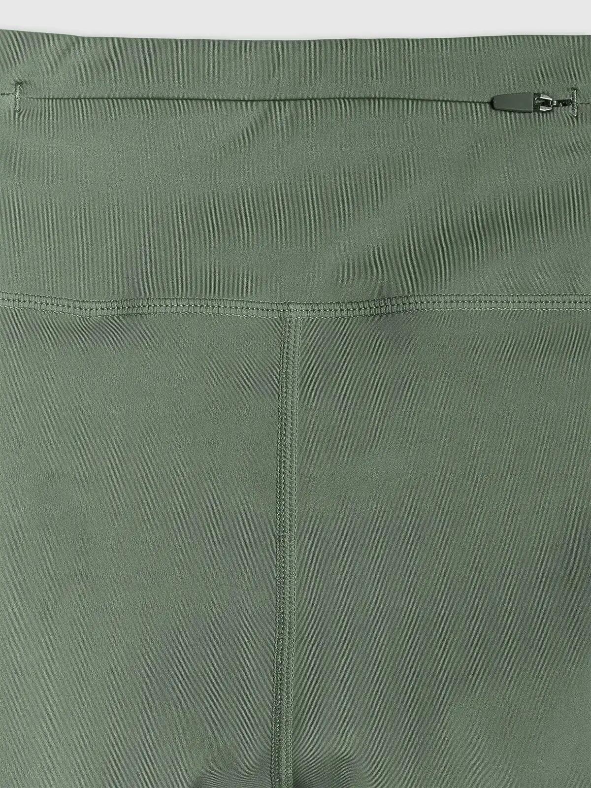 LEGGINSY DAMSKIE 4F KRÓTKIE KOLARKI SZYBKOSCHNĄCE  PRZED KOLANO KOLOR ZIELONY 12/13