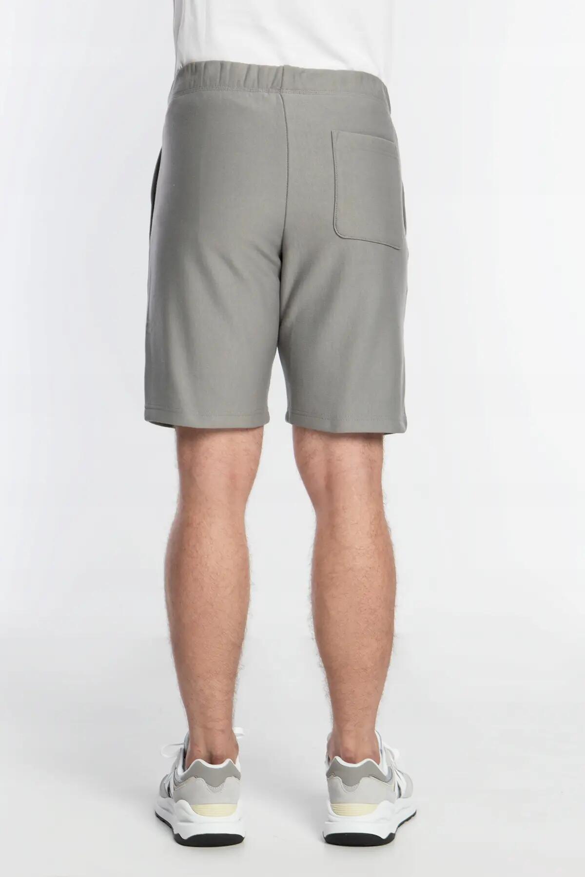 SPODENKI MĘSKIE SPORTOWE CARHARTT WIP PRZED KOLANO KOLOR SZARY 4/5