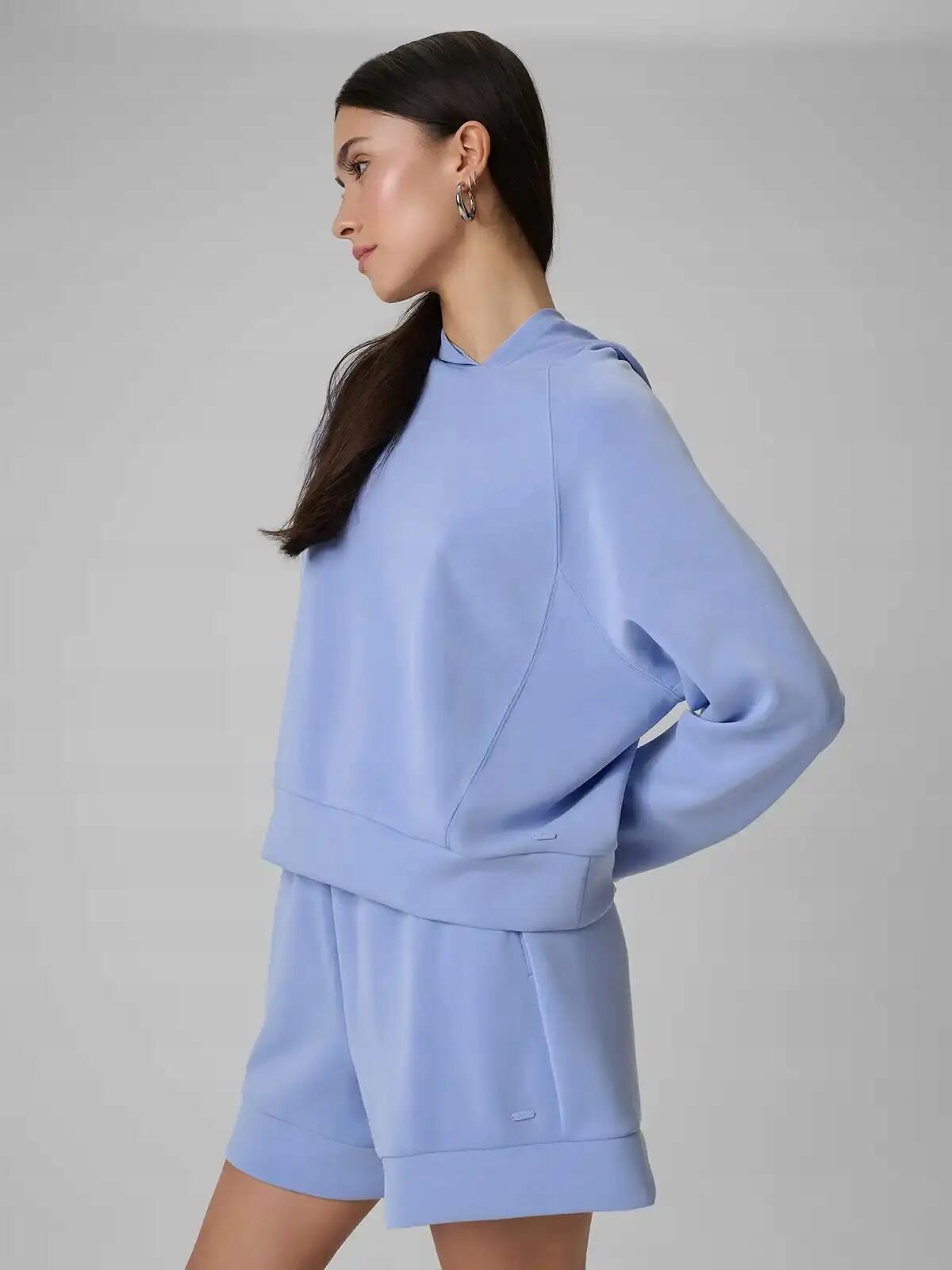 BLUZA DAMSKA 4F DRESOWA NIEROZPINANA Z KAPTUREM Z MODALEM KOLOR NIEBIESKI 2/12