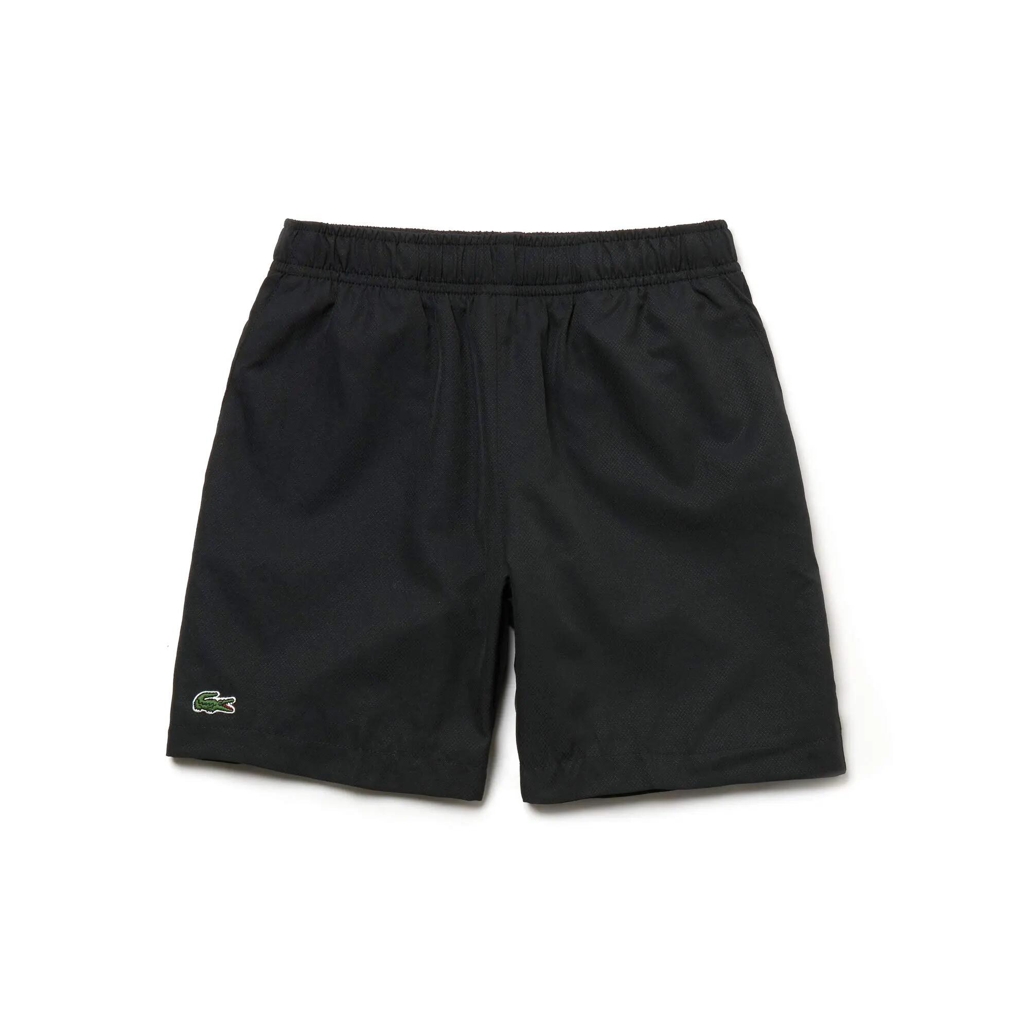 Bermuda tennis garçon - taille élastique et poches - bleu 1/1
