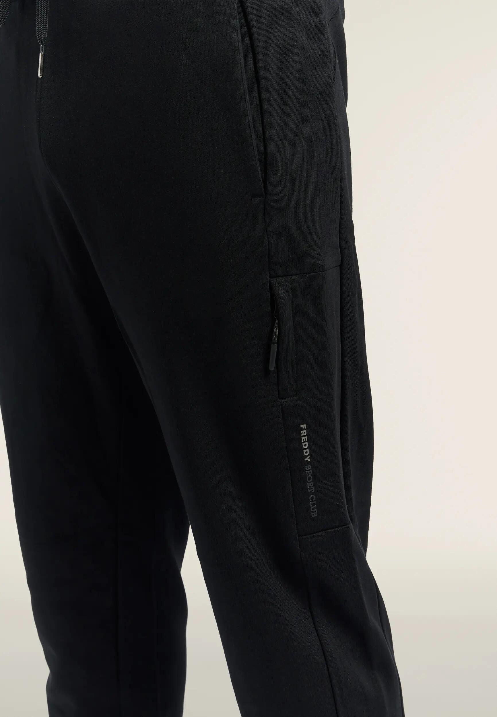 Pantalón de hombre regular con bajos elásticos y pespunte a doble aguja 4/6