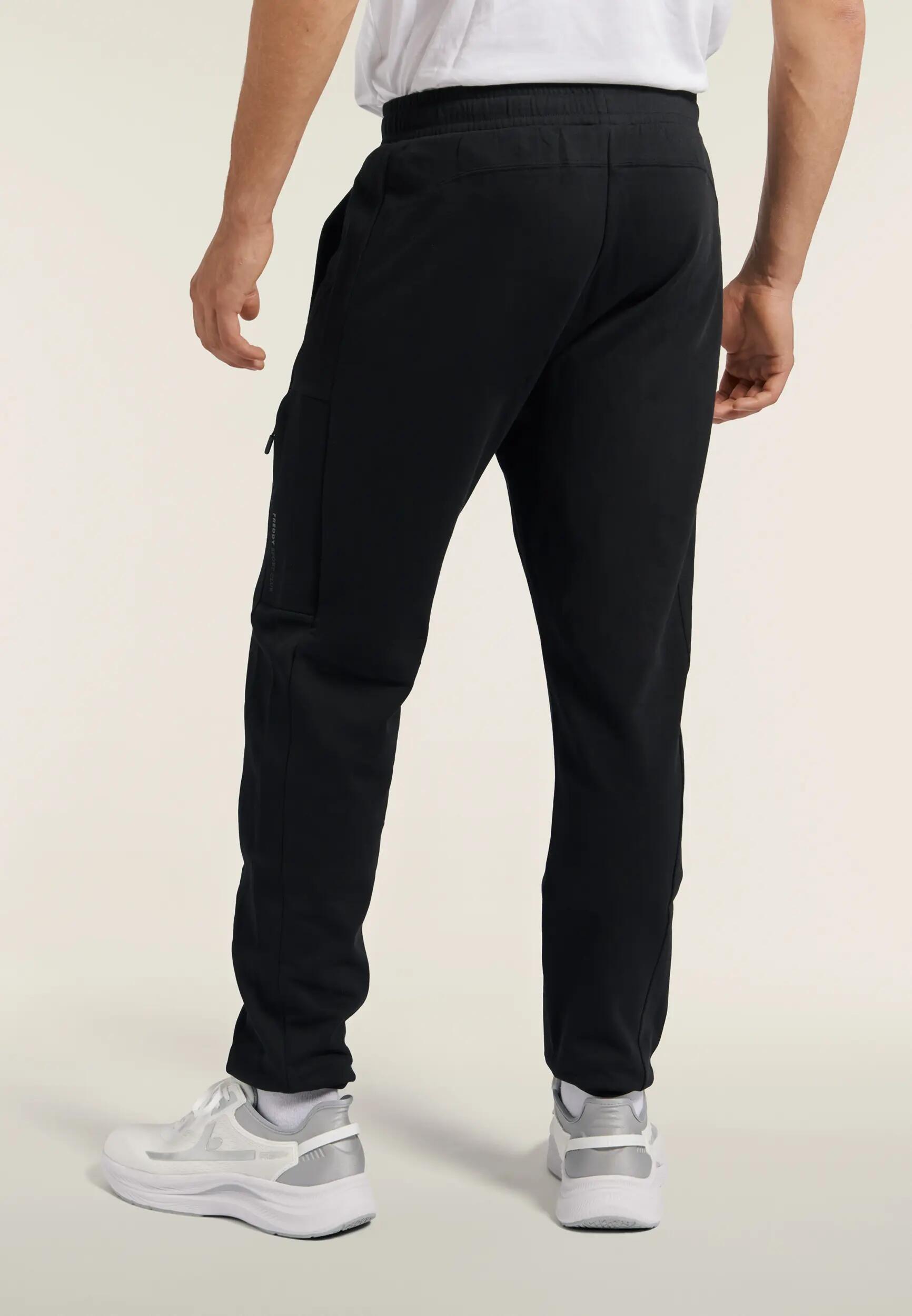 Pantalón de hombre regular con bajos elásticos y pespunte a doble aguja 3/6