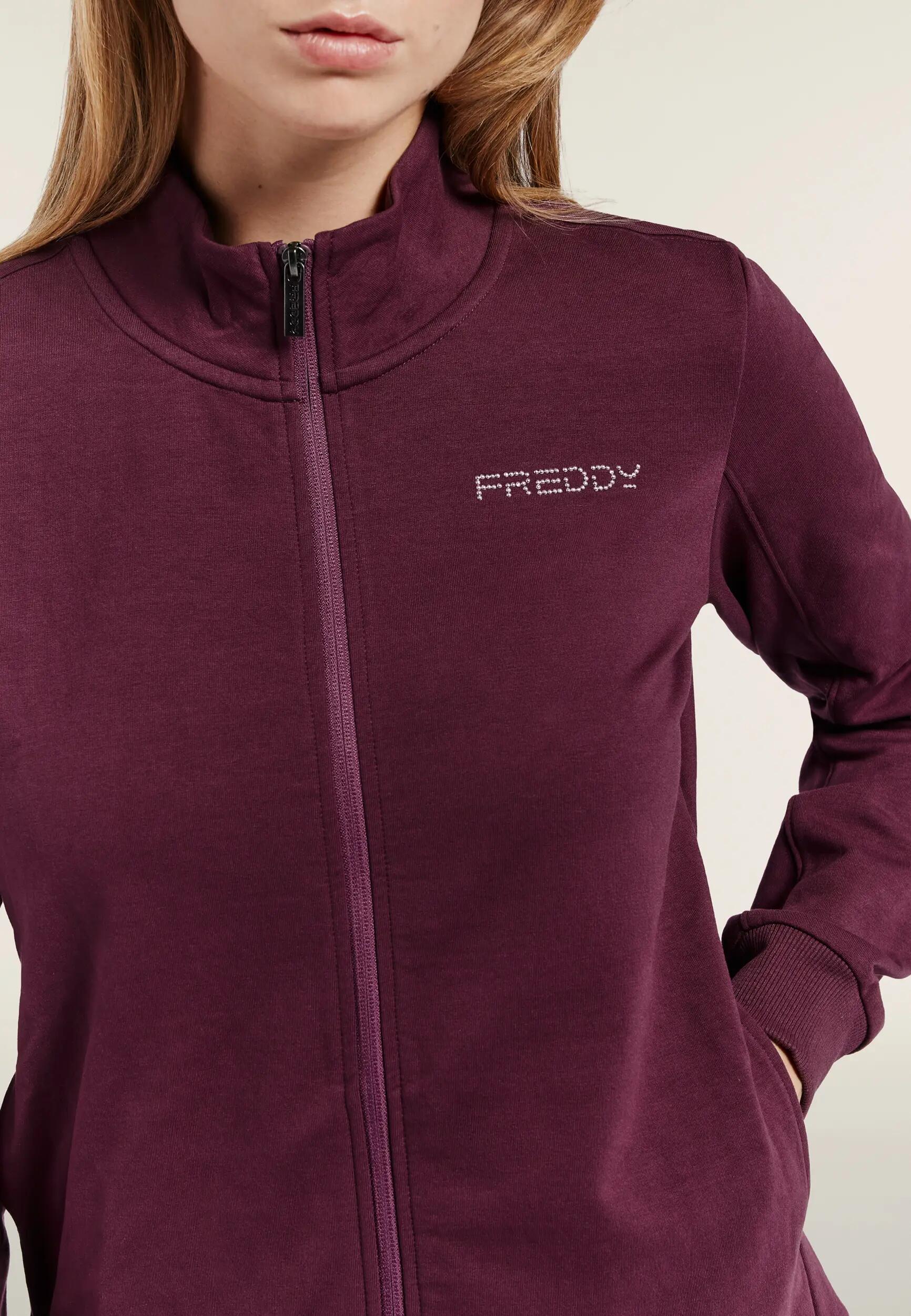 Chándal deportivo de mujer con cremallera, cuello alto y logotipos de cuentas 9/9