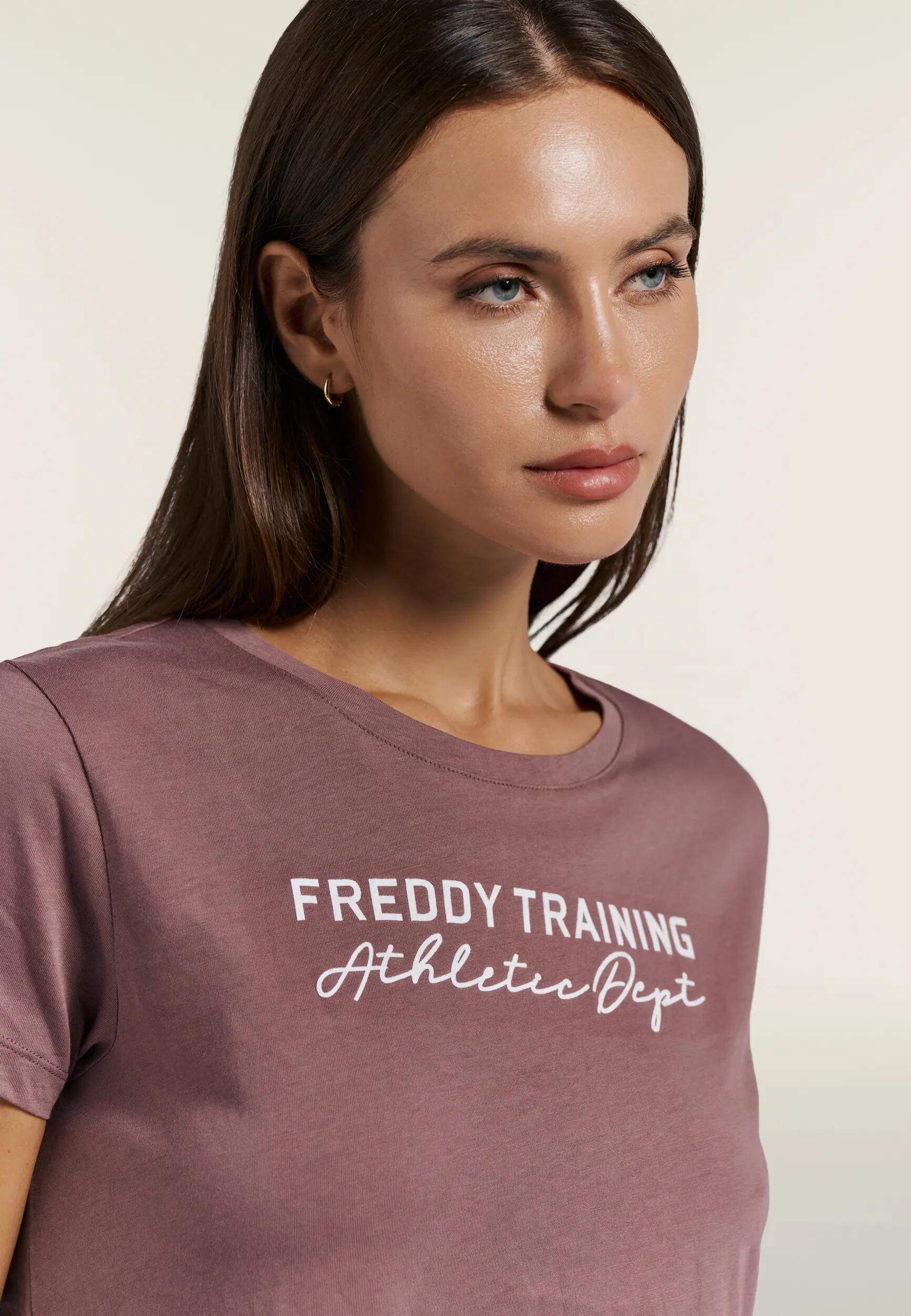 Camiseta para mujer de corte regular en tejido de punto con aberturas en el bajo 4/6