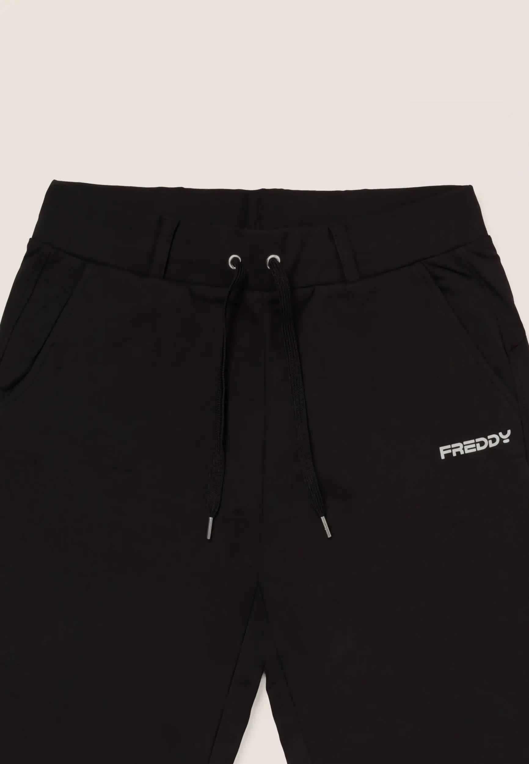 Pantalón deportivo slim con aberturas en el bajo 3/3