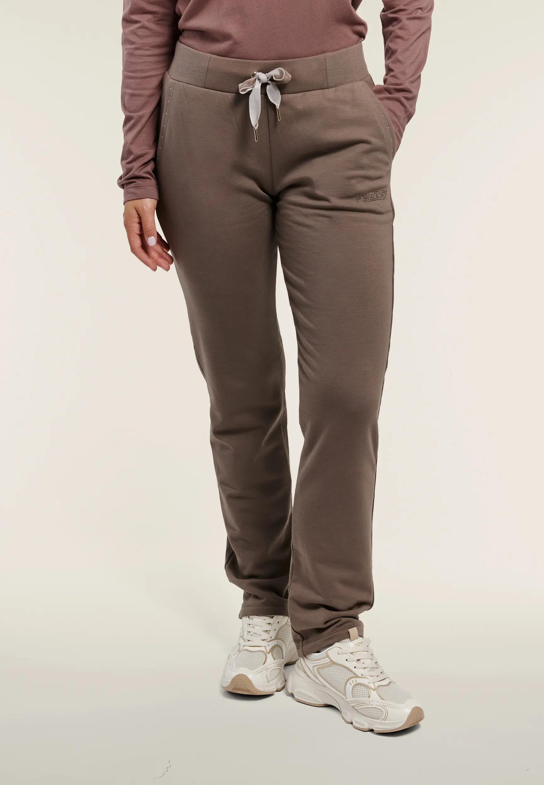 Dames sportbroek met studs op de zakken en logo 2/6