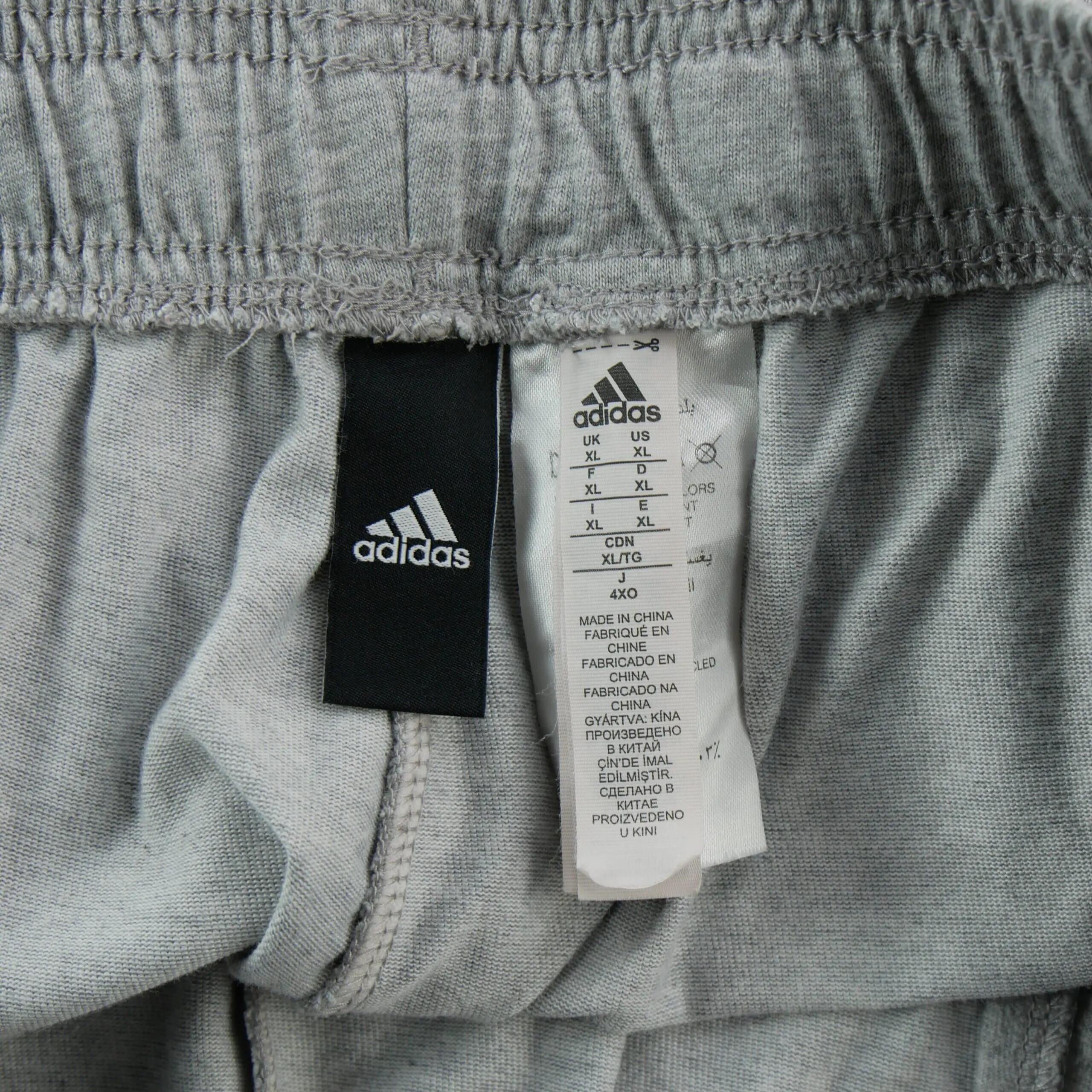 Second hand - Joggings Uomo Logo Performance Grigio - Stato eccellente 5/7