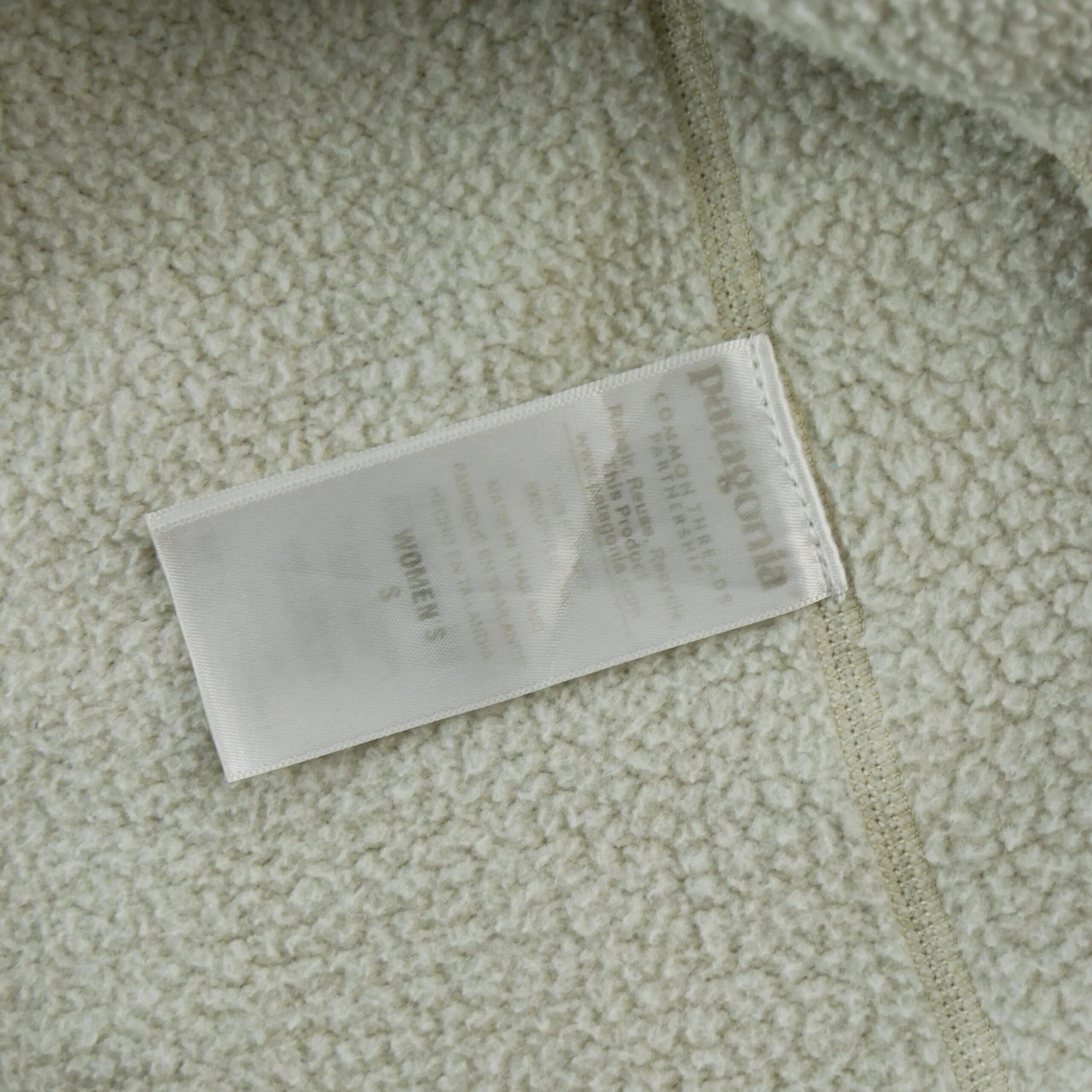 Pile donna beige 1/4 zip con tasca sulla manica 8/9