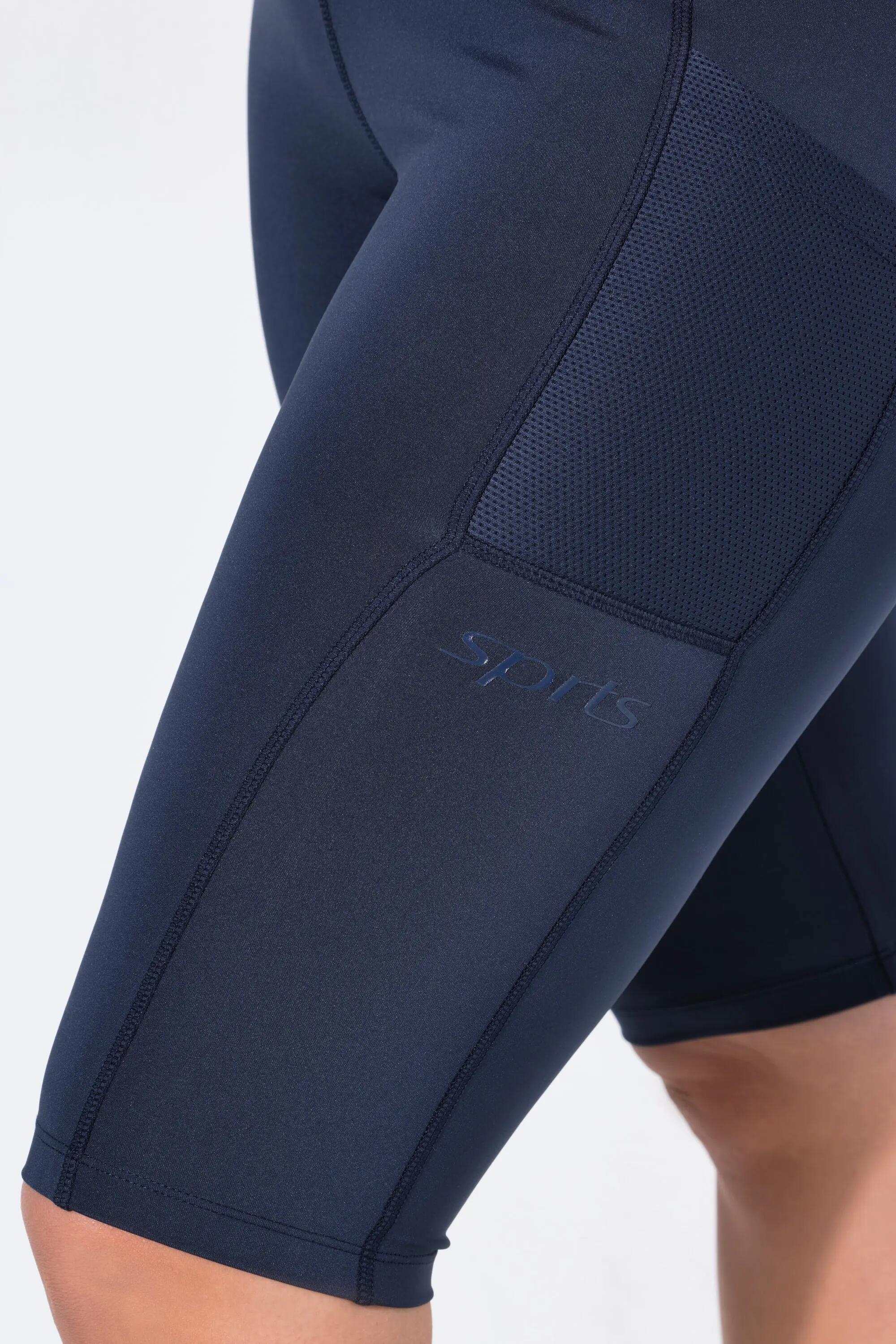 Femme Legging court en matière recyclée taille élastique et poche en mesh 8/11