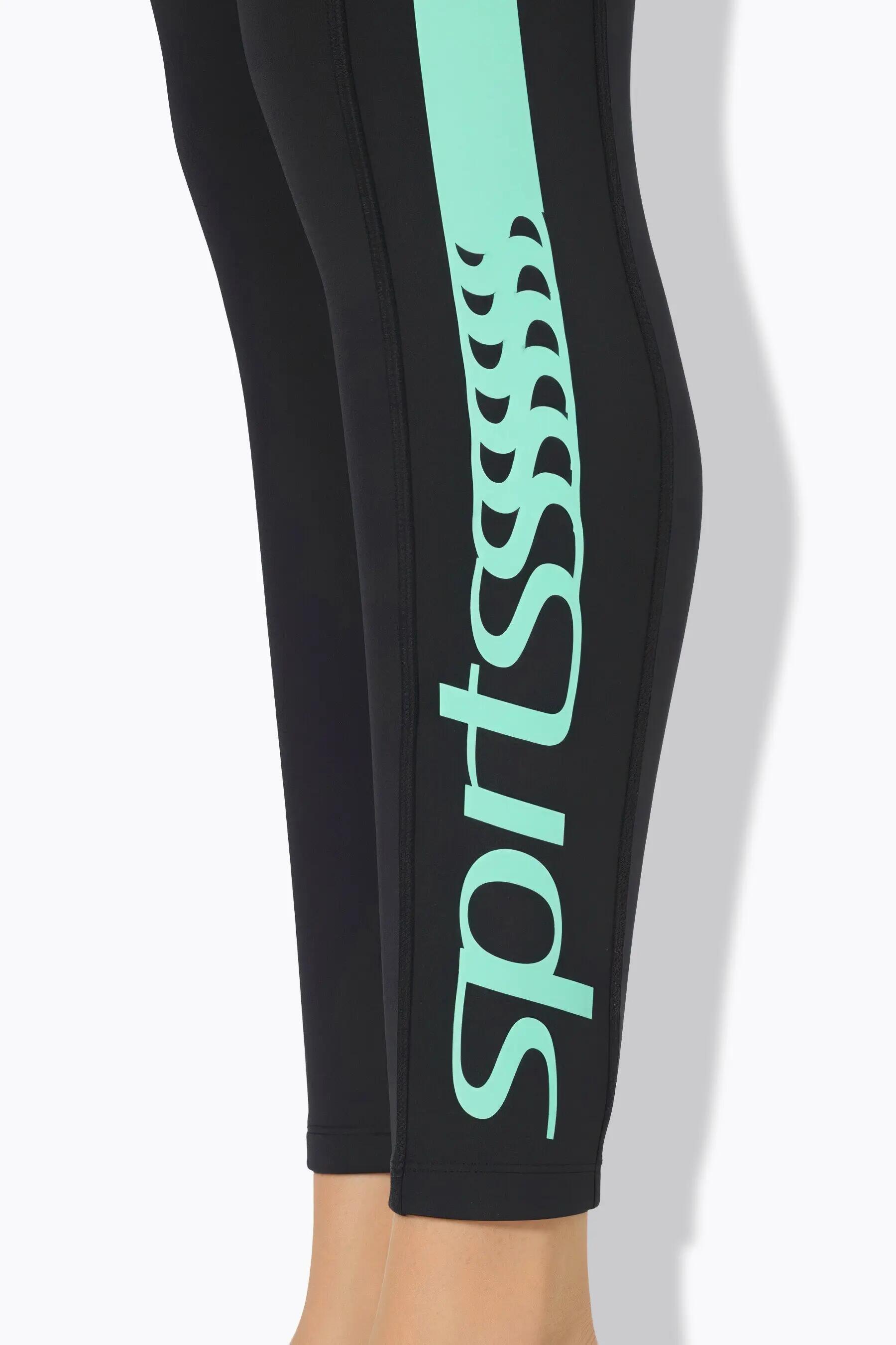 Femme Legging technique taille haute bande colorée sur la jambe matière recyclée 6/9