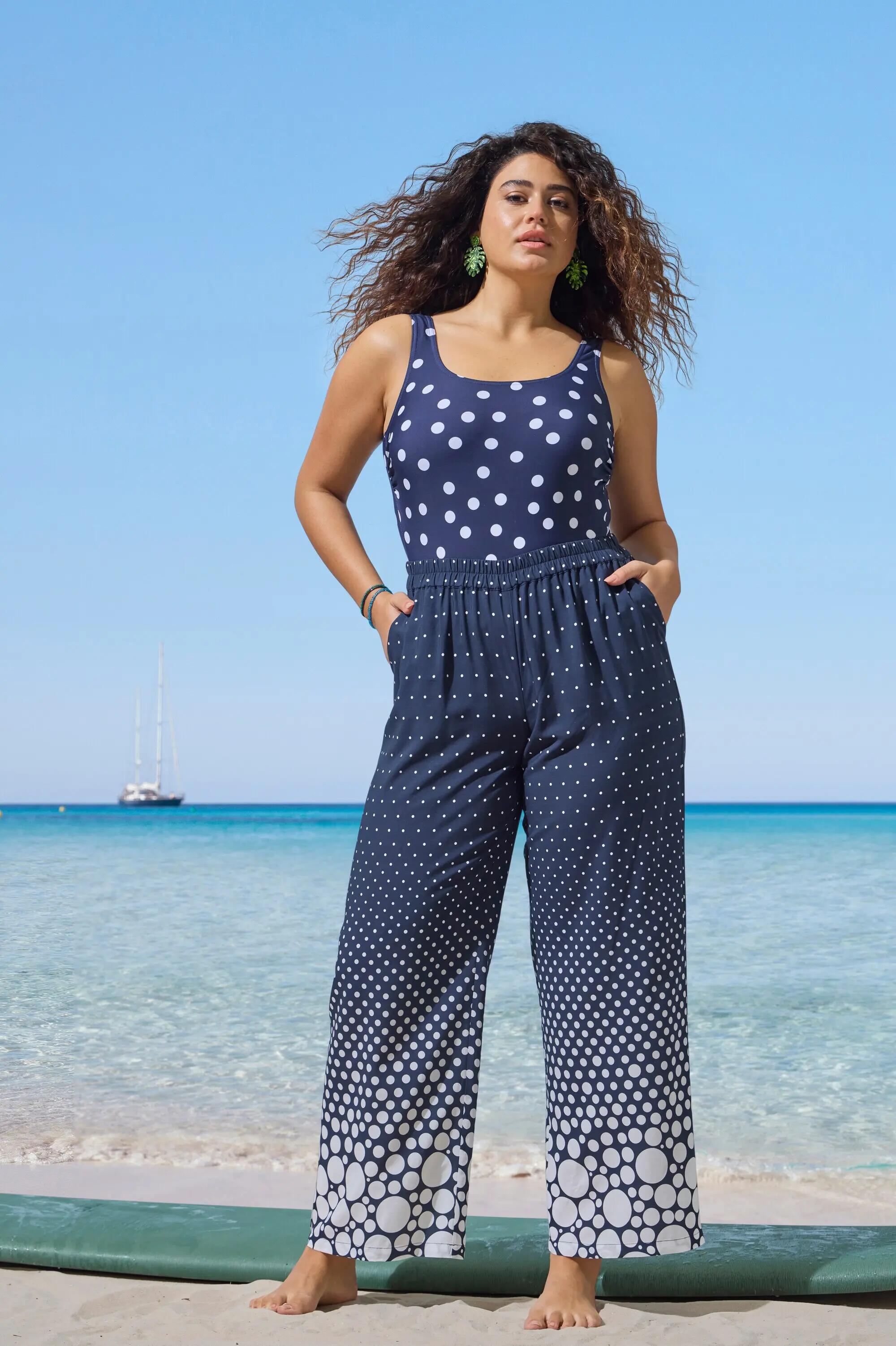 Femme Pantalon palazzo à pois. Jambe large et droite. Taille élastique 3/13