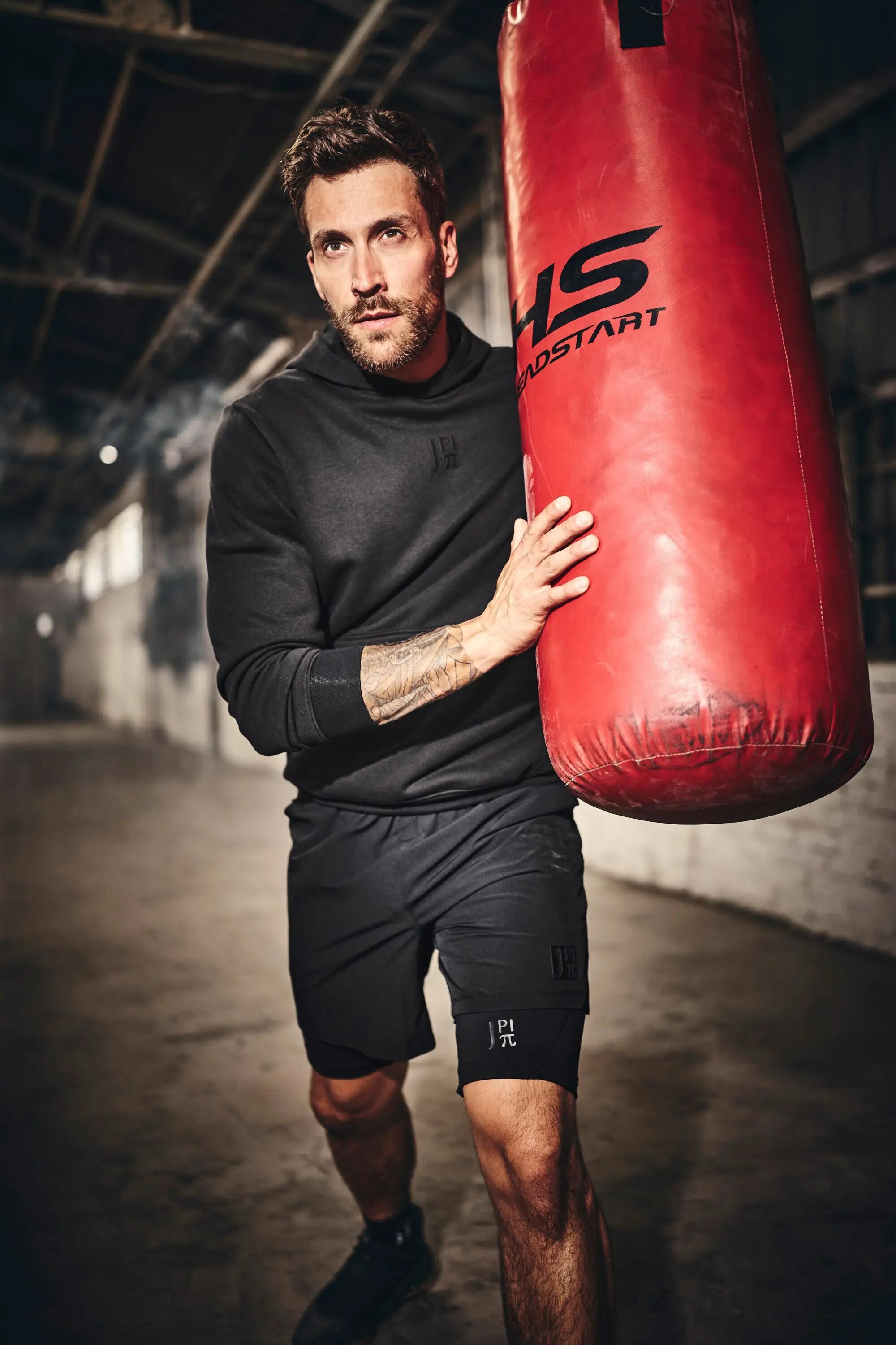 Hommes Sweat-shirt à capuche imprimé dans le dos collection Fitness 11/11