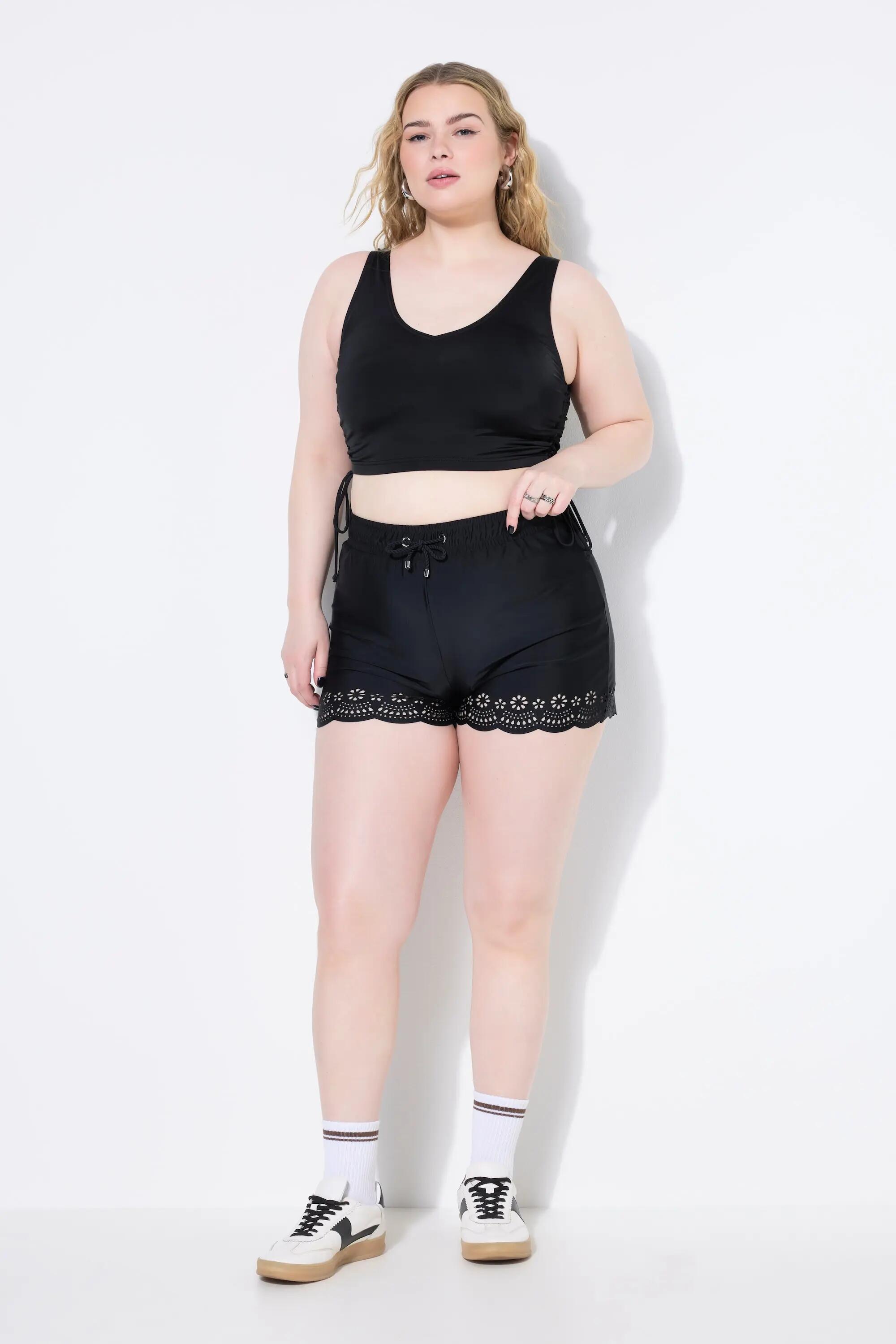 Femme Short de bain à taille élastique. Jambe large et découpes au laser 10/13