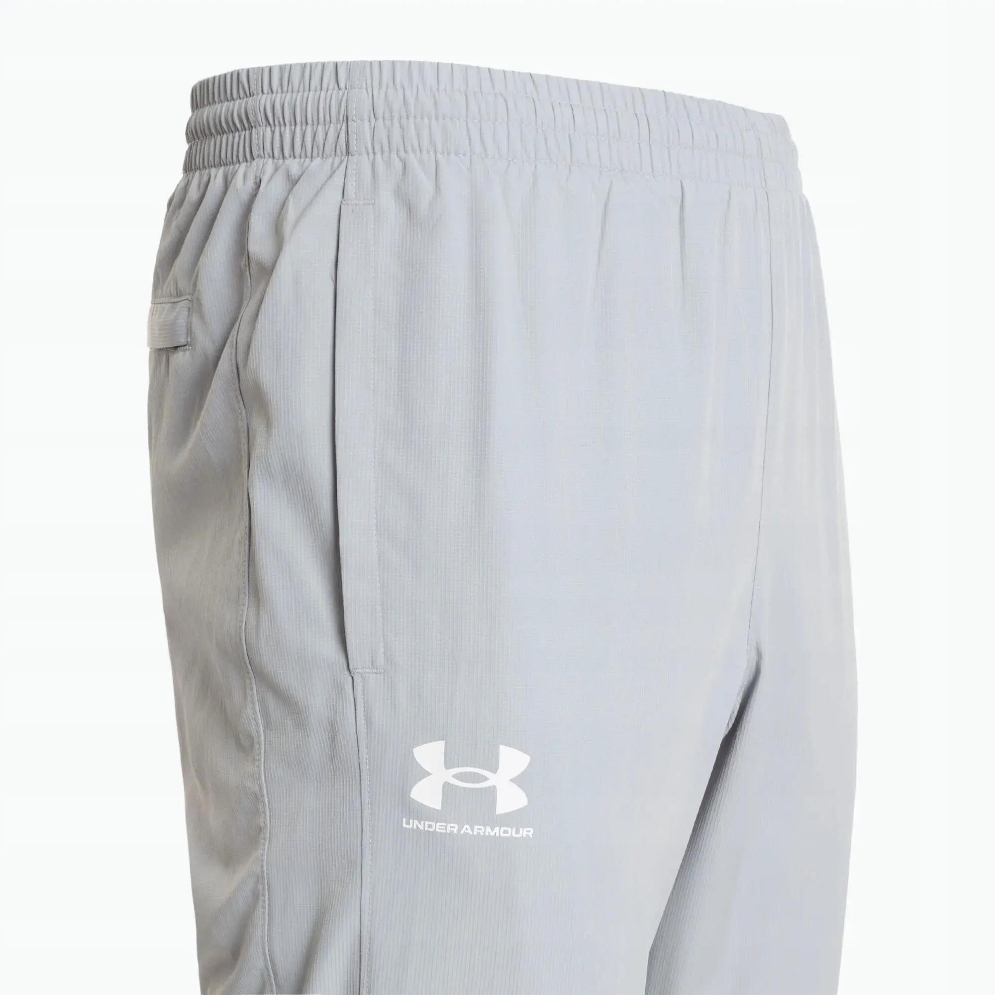 SPODNIE WIATROODPORNE MĘSKIE UNDER ARMOUR WARMUP BOTTOMS XS 3/4