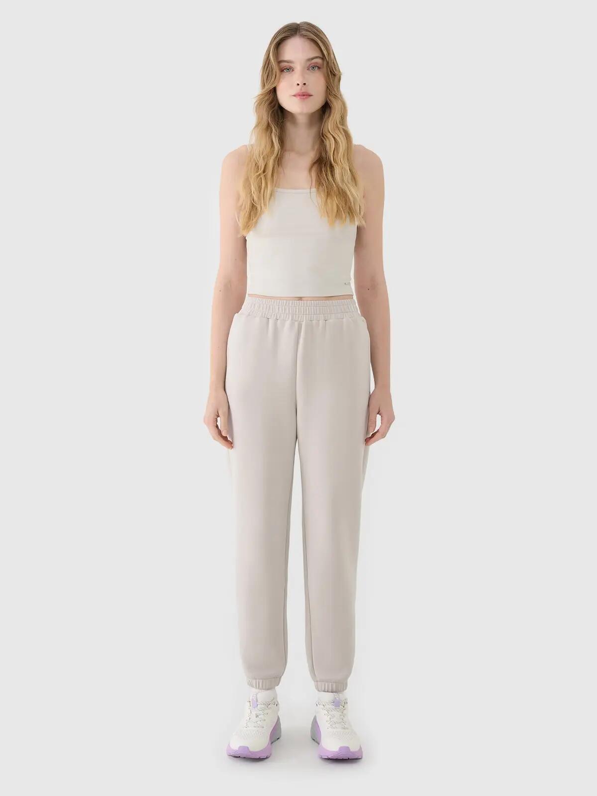 SPODNIE DAMSKIE 4F DRESOWE XL JOGGERY Z MODALEM TTROF1010 6/8
