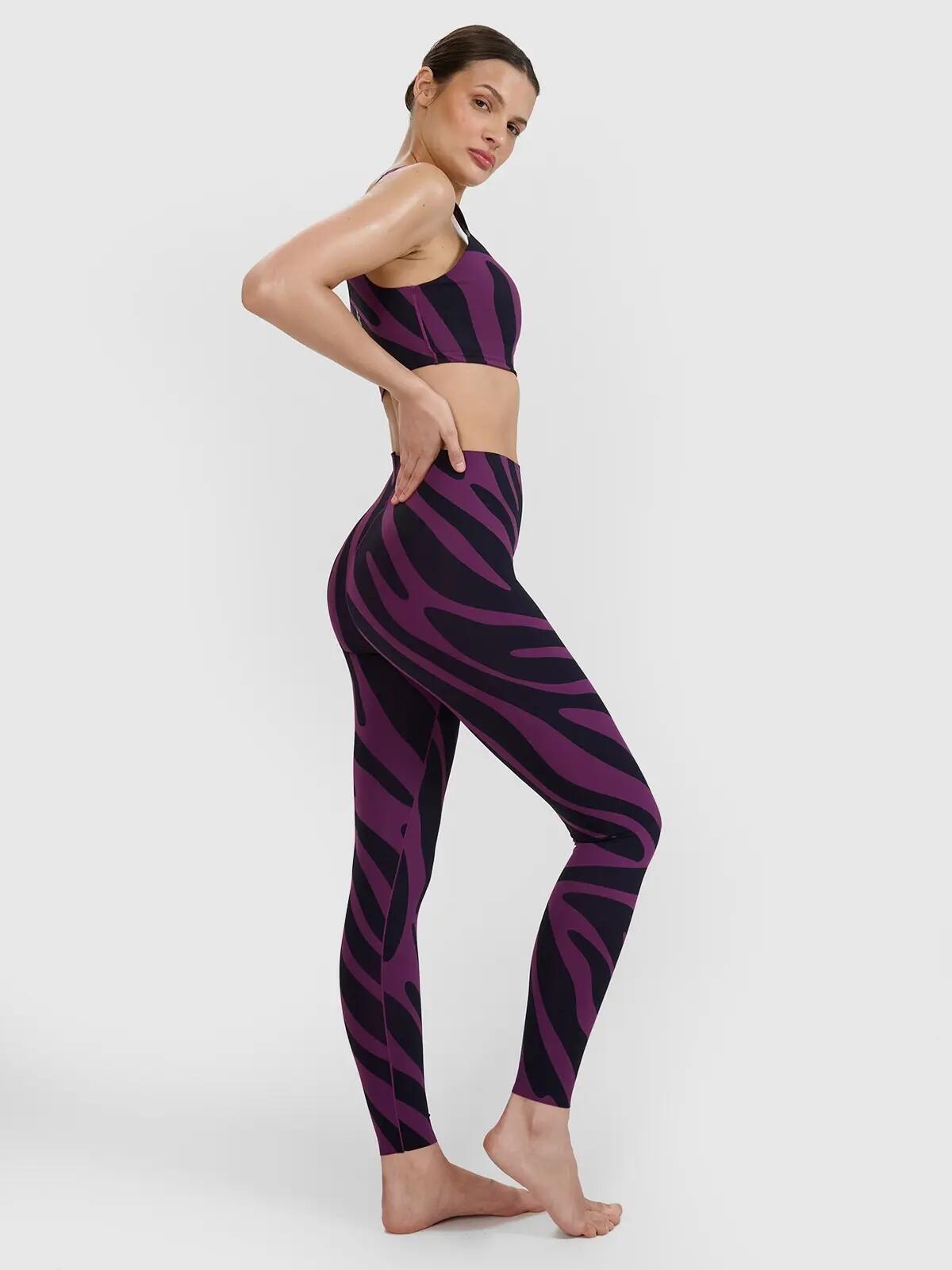 LEGGINSY DAMSKIE 4F DO JOGI SZYBKOSCHNĄCE  KOLOR FIOLETOWY 3/8