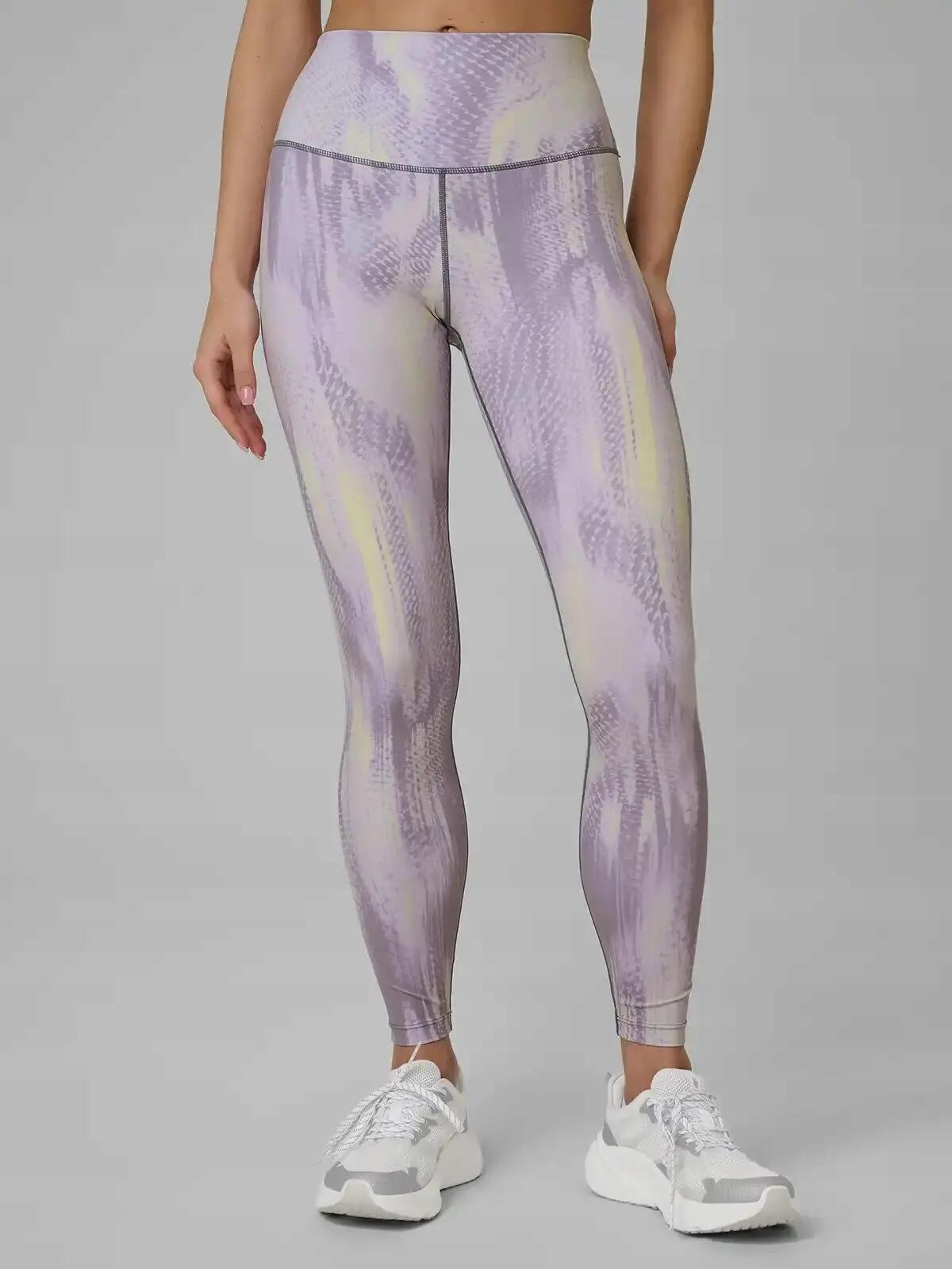 LEGGINSY DAMSKIE 4F TRENINGOWE SZYBKOSCHNĄCE Z WYSOKIM STANEM KOLOR ŻÓŁTY 3/12