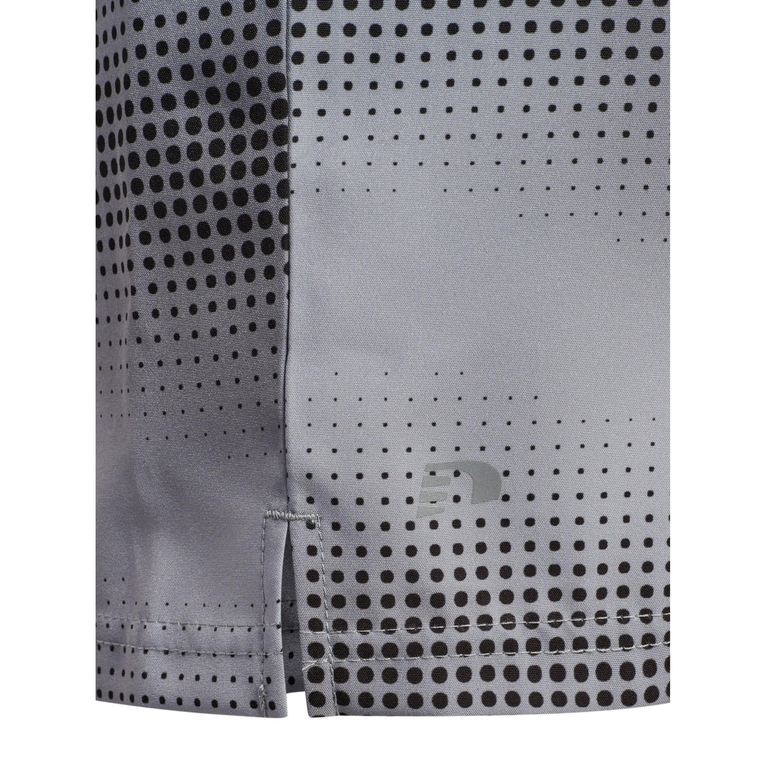 hummel nwlSTRIDE AOP 5inch Shorts en poliéster elástico 3/4