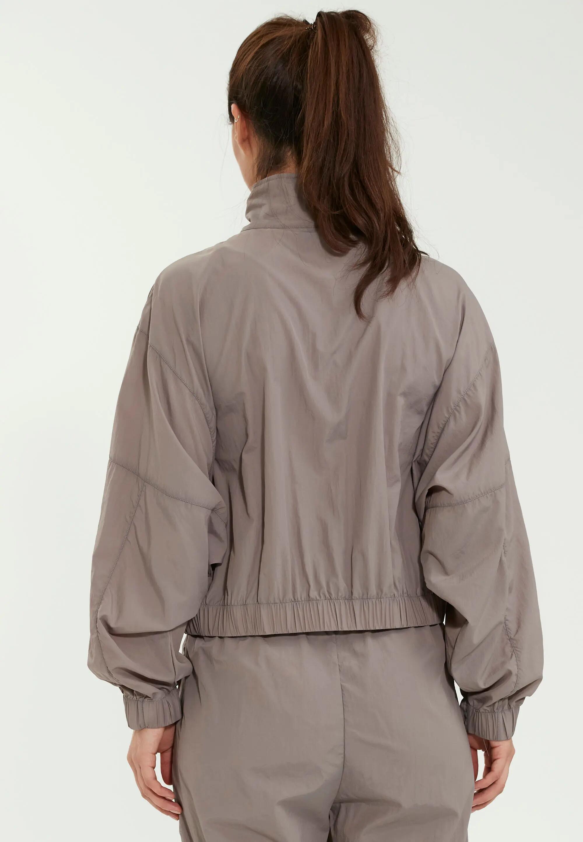 Trainingsjacke Tharbia 6/11