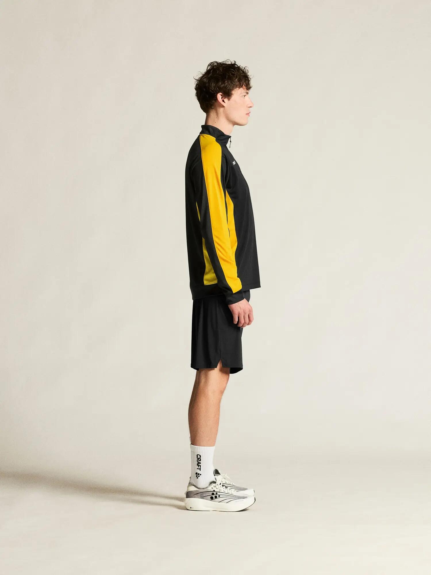 craft Evolve 2.0 Contrast Half Zip M - Dehnbarer Midlayer – Black/Sweden yellow 6/7