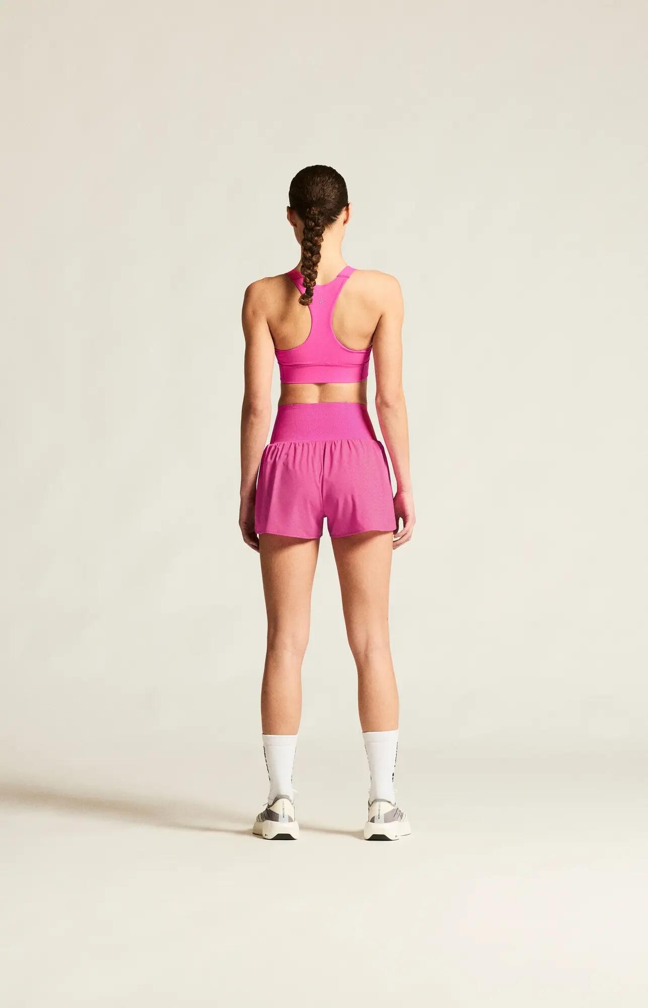 craft Hypervent Pocket Sports Top W – Sporttop mit Fronttaschen – Magenta 6/7