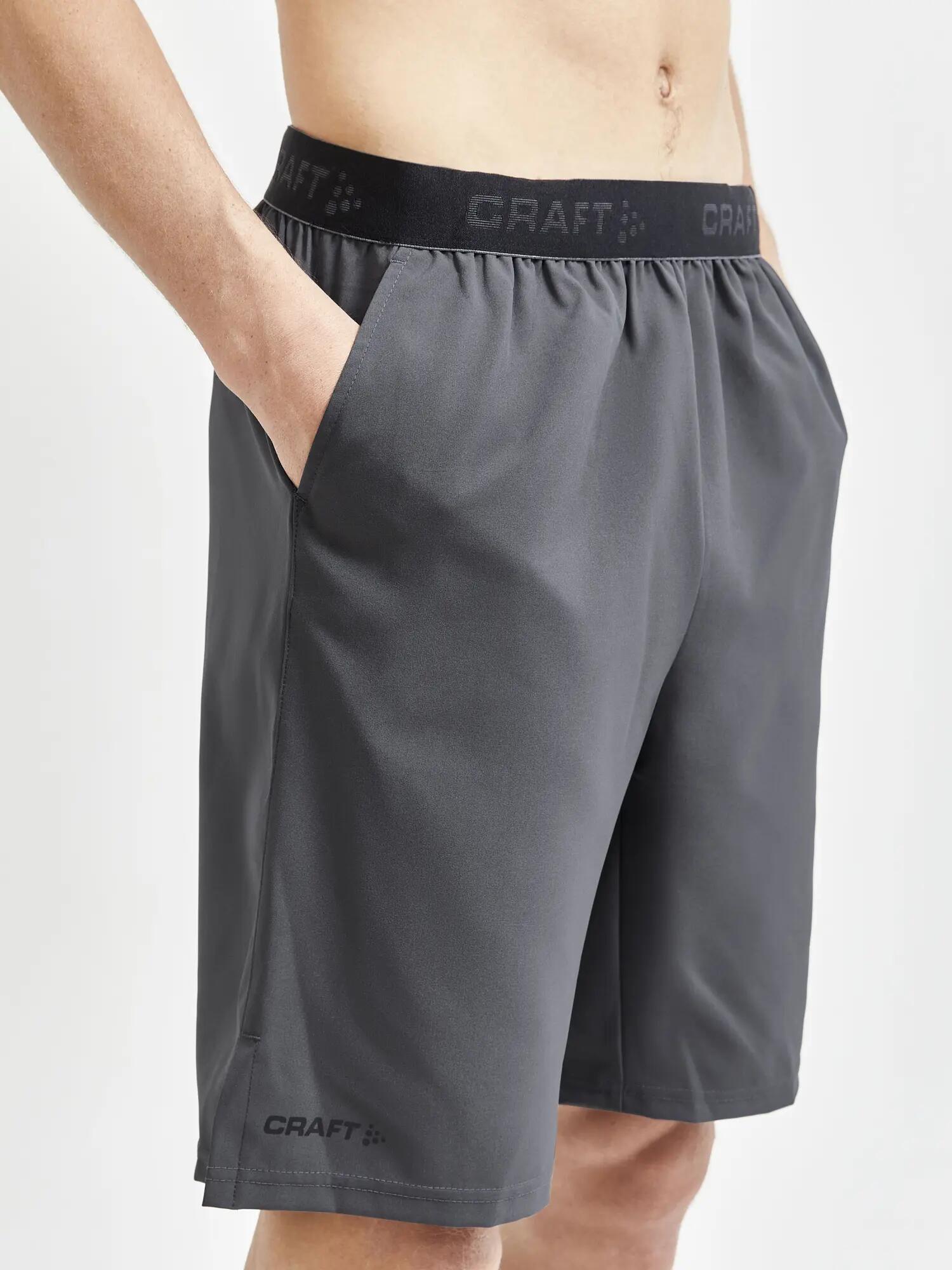 craft CORE Essence Relaxed Shorts M – Locker sitzende Trainingsshorts – Granite 4/5