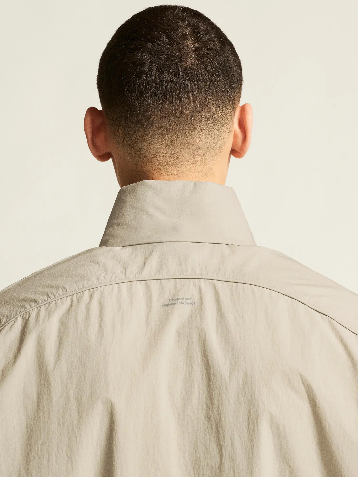 craft Hypervent Oversized Wind Jacket — Lichtgewicht, opvouwbaar – Plaster 6/7