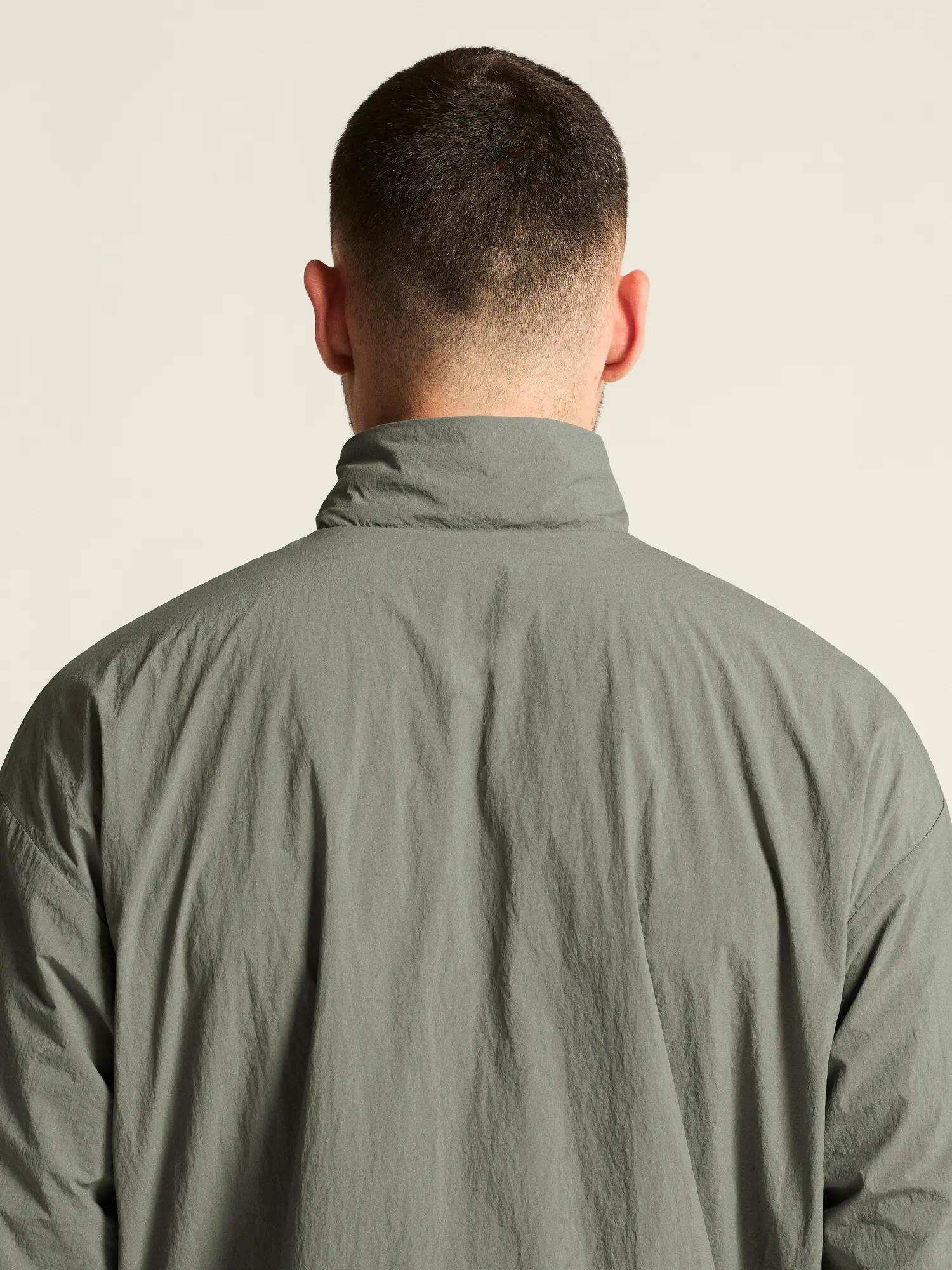 craft SubZ Overhead Jacket M – leicht isoliert, lockere Passform – Leaf 6/7