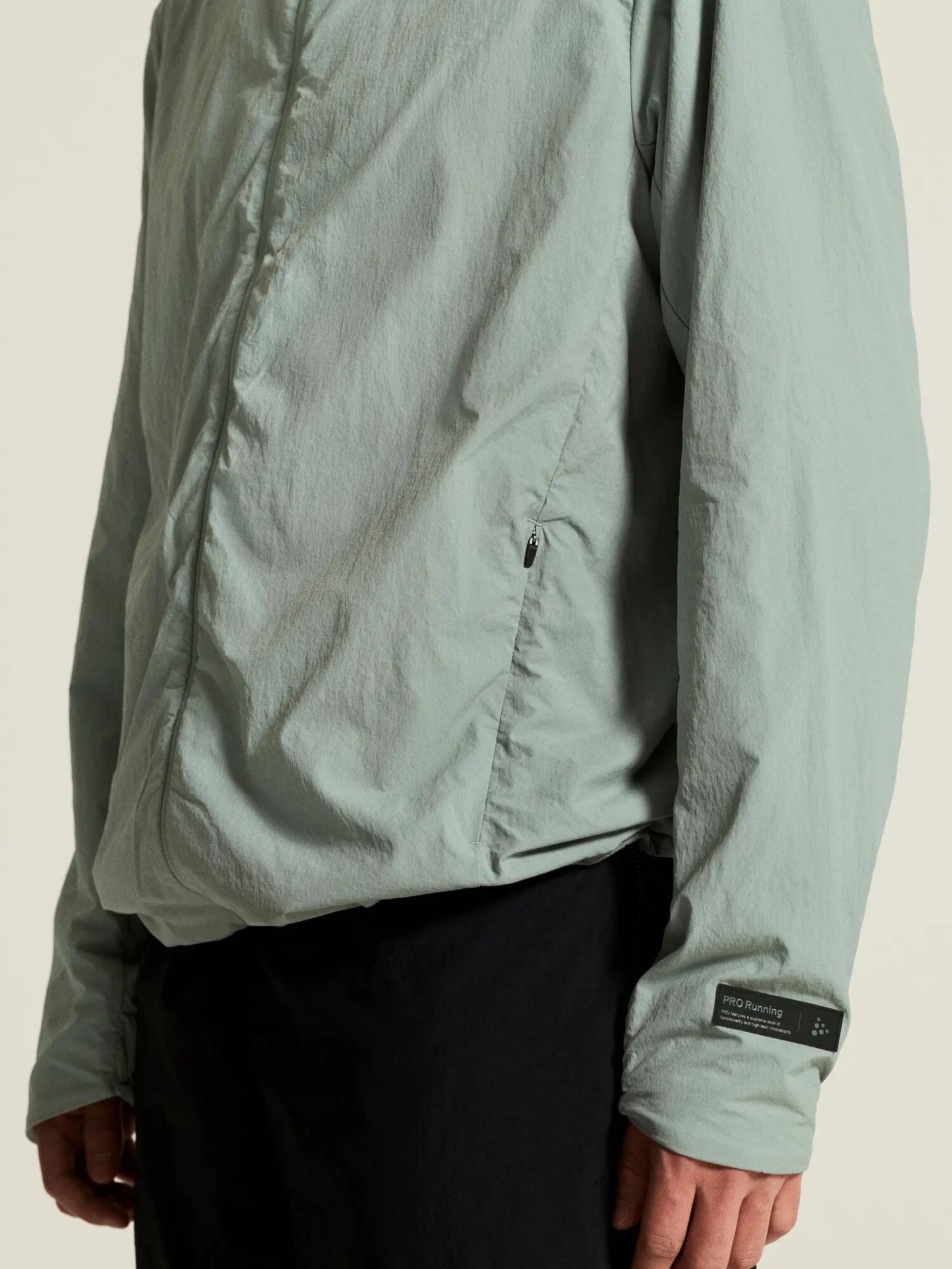 craft SubZ Light Jacke M mit Kapuze und leichter Isolierung – Pale Leaf 7/7