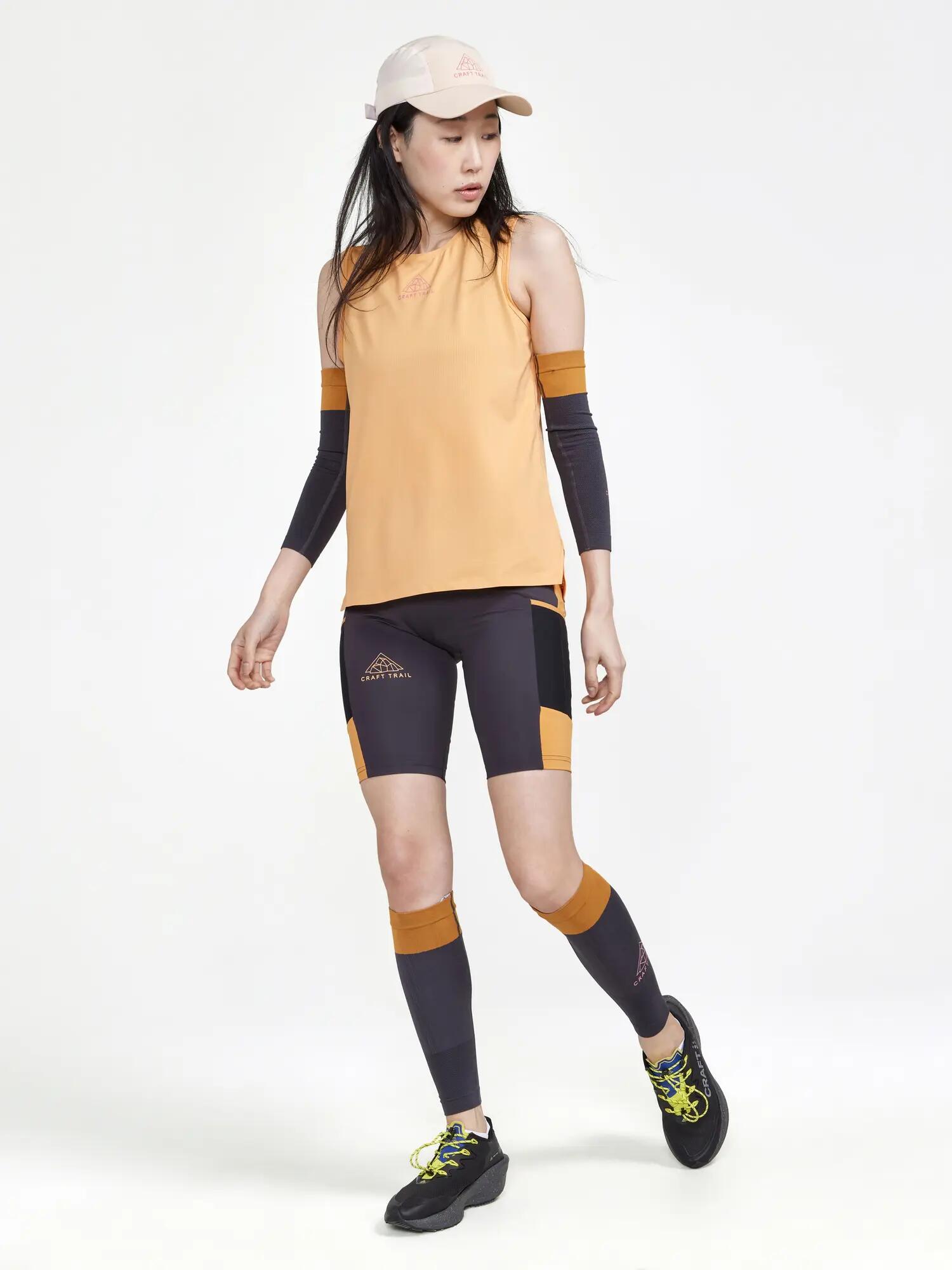 craft PRO Trail Singlet W — Damen-Singlet mit Stretch-Mesh am Rücken – Peach 6/6