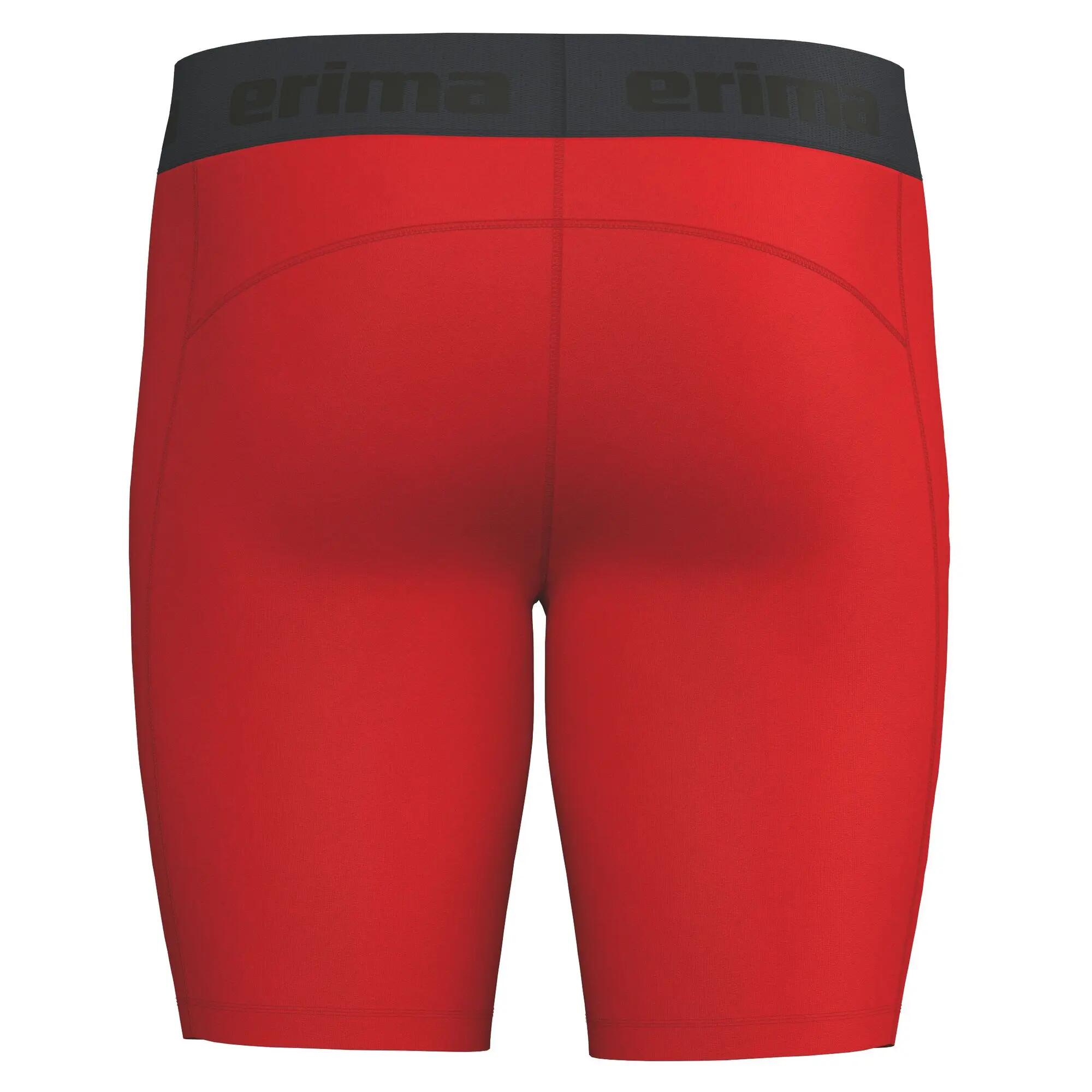 Rode sporttights met hoge taille. 4/5
