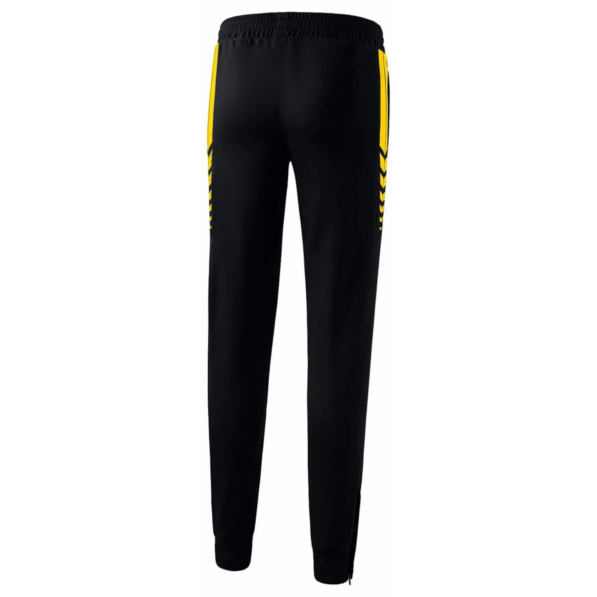 Pantalon - entraînement - femmes - jambes fuselées - Six Wings - noir/jaune 8/9