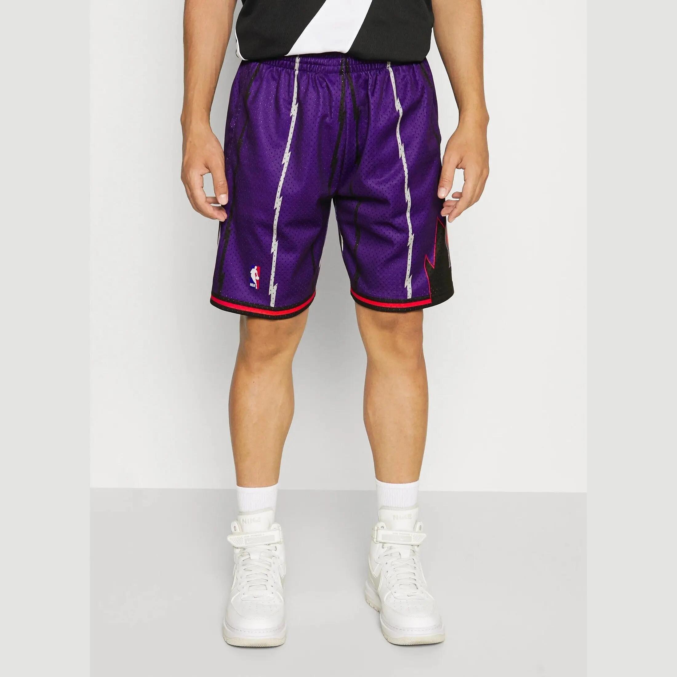 Calções Mitchell & Ness Swingman Toronto Raptors '98 roxos 4/7