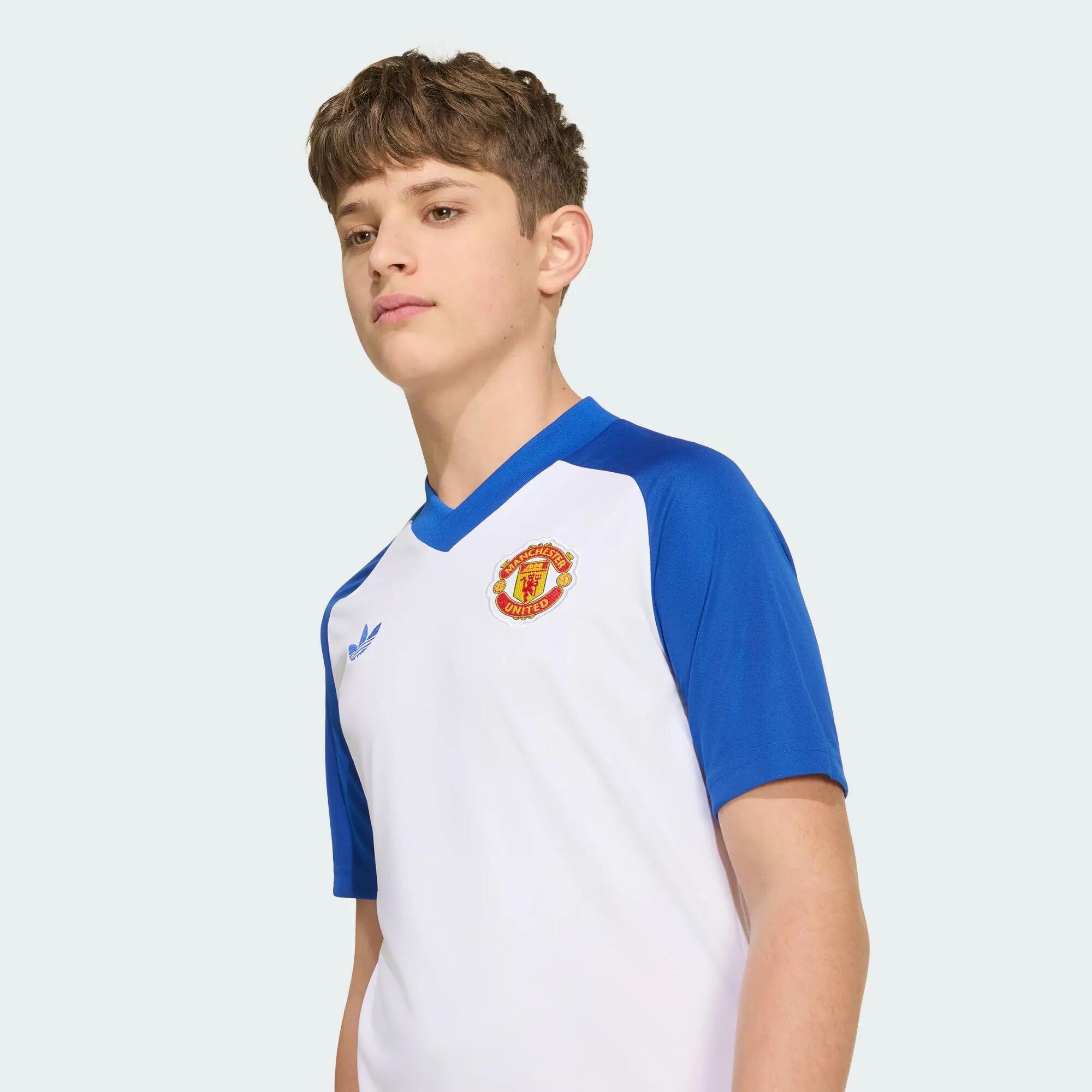 Dziecięca koszulka przedmeczowa Manchester United 26/27 4/7