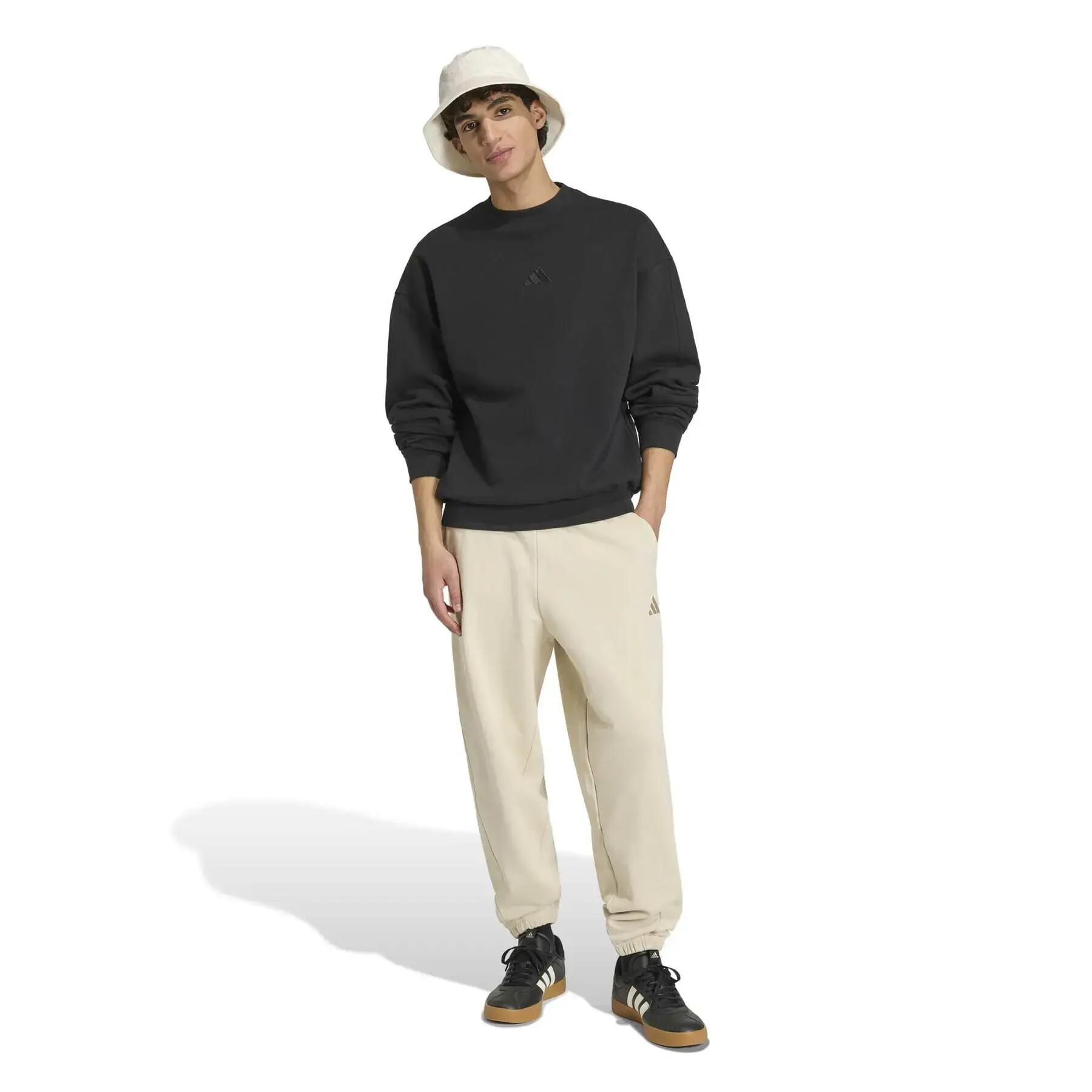 Spodnie dresowe Regular adidas Small Logo Cuffed 3/6