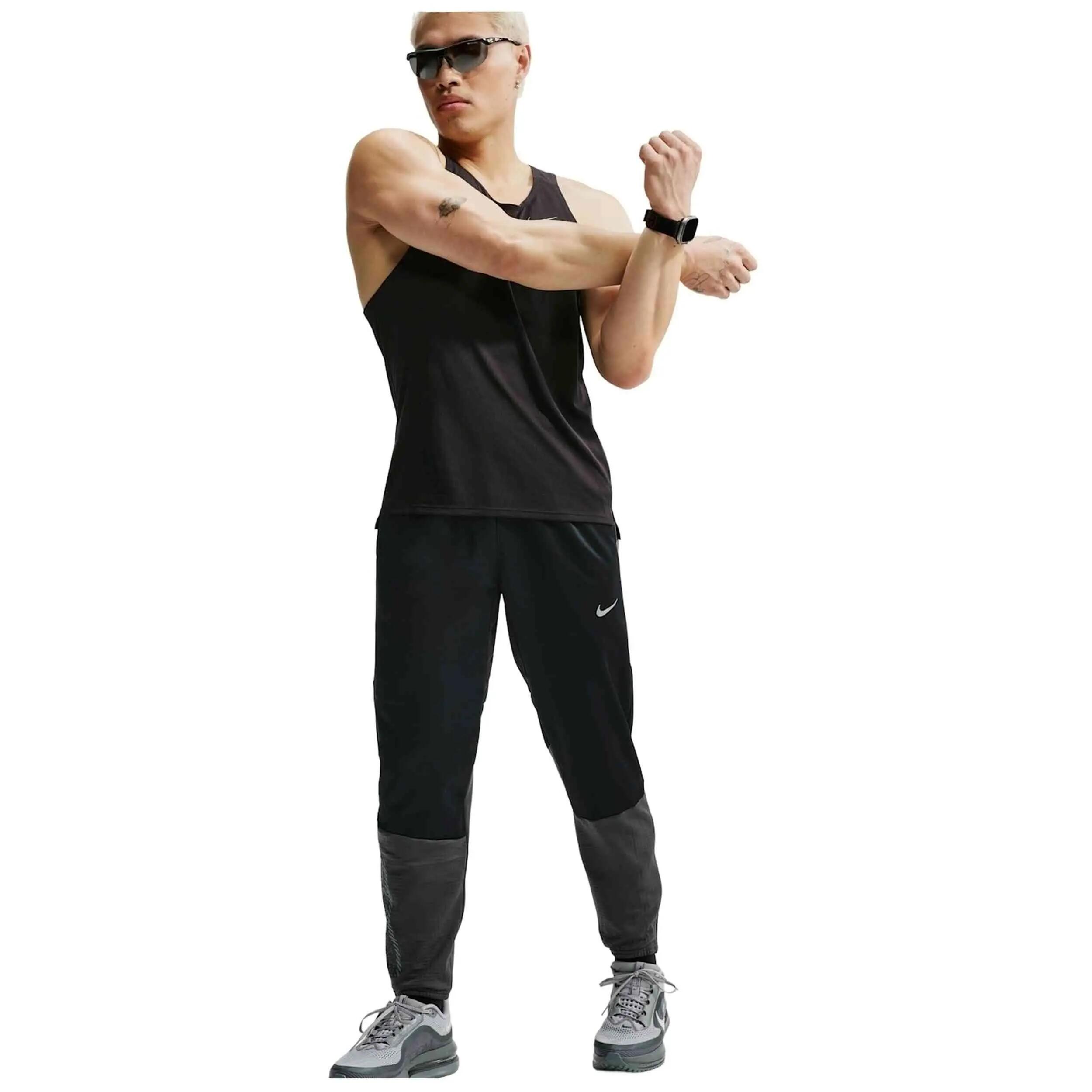 Pantaloni della tuta Nike modello HV2673-010 per uomini 4/5
