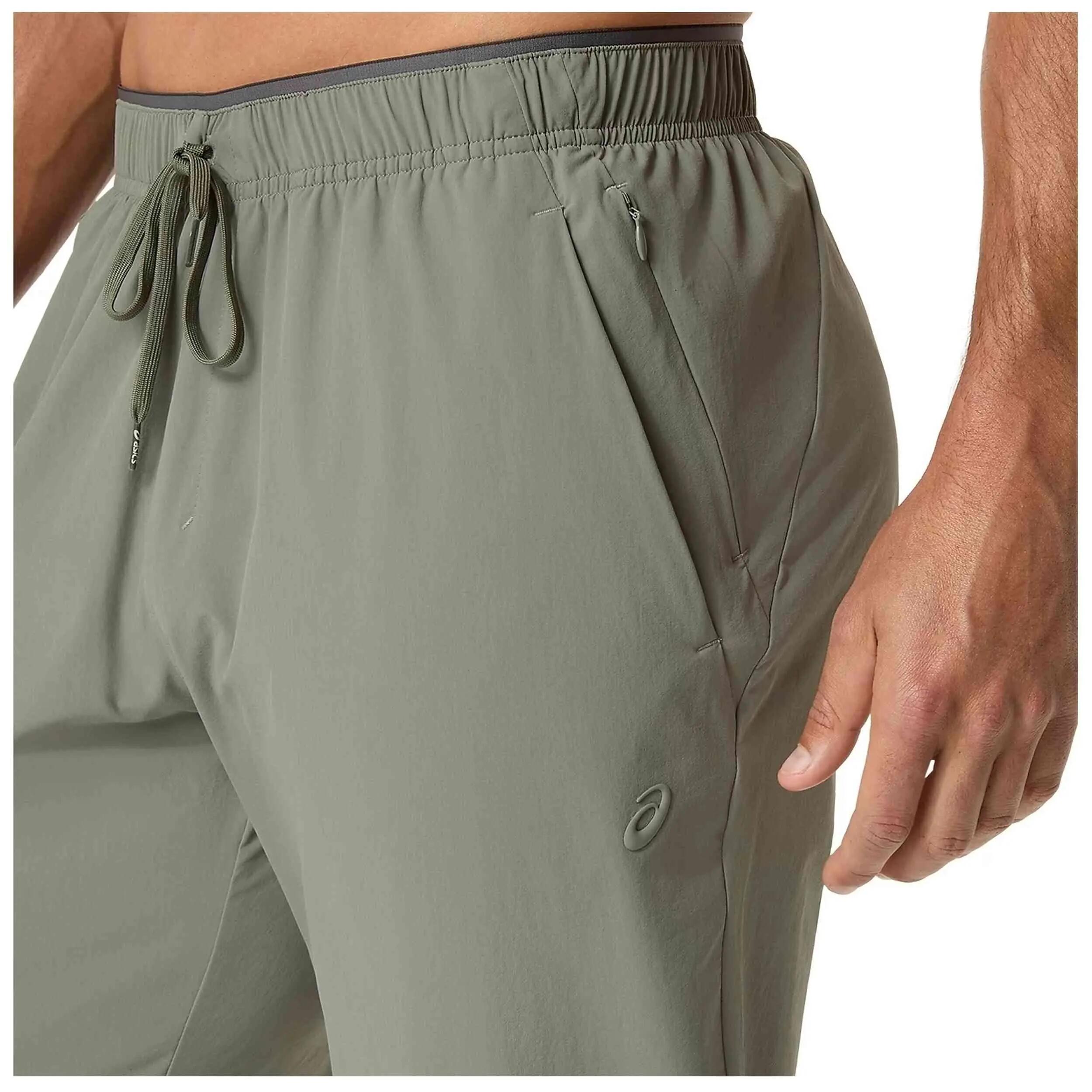 Pantalon de survêtement Asics modèle COMFORT CORE STRETCH WOVEN PANT pour homme 5/5