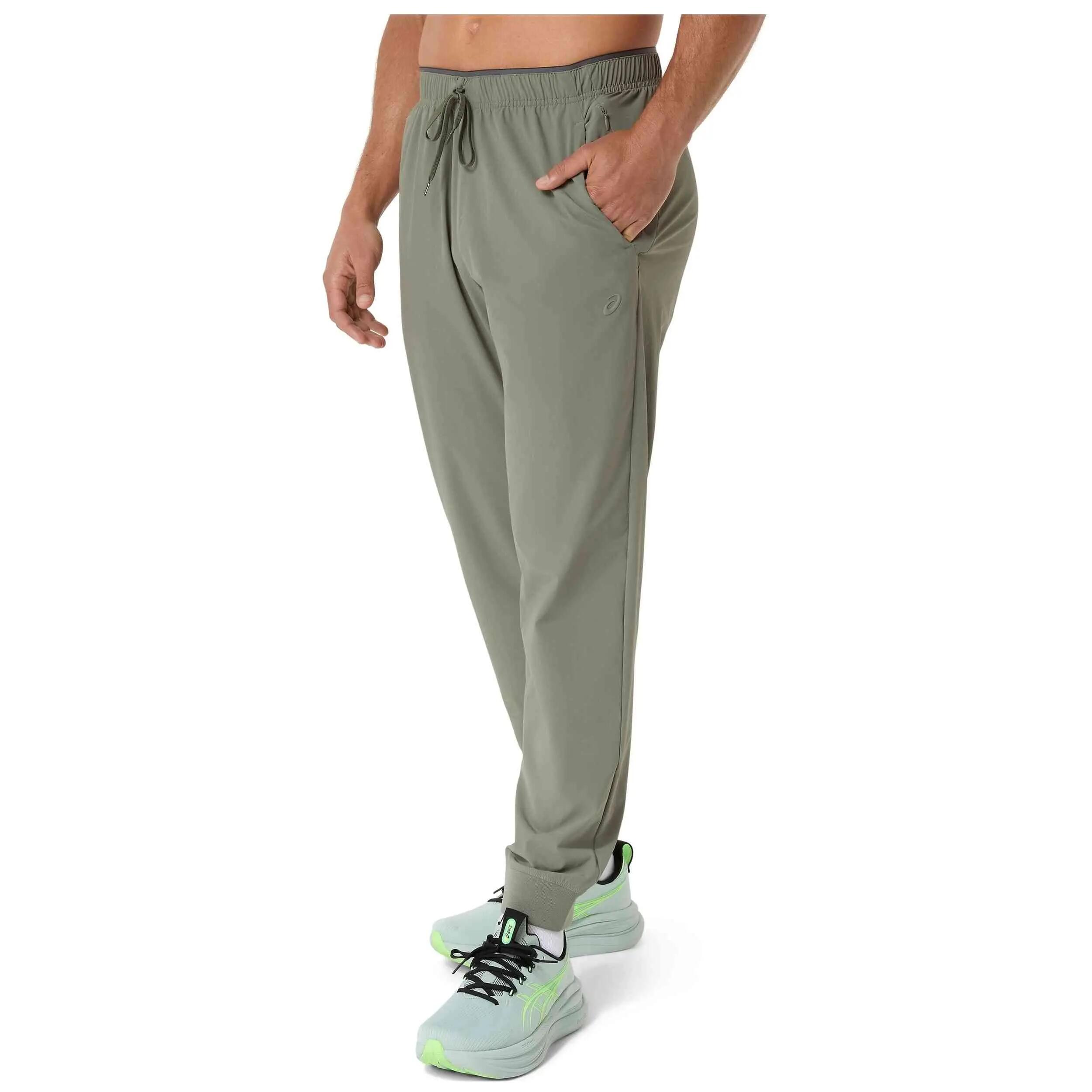 Pantalon de survêtement Asics modèle COMFORT CORE STRETCH WOVEN PANT pour homme 3/5