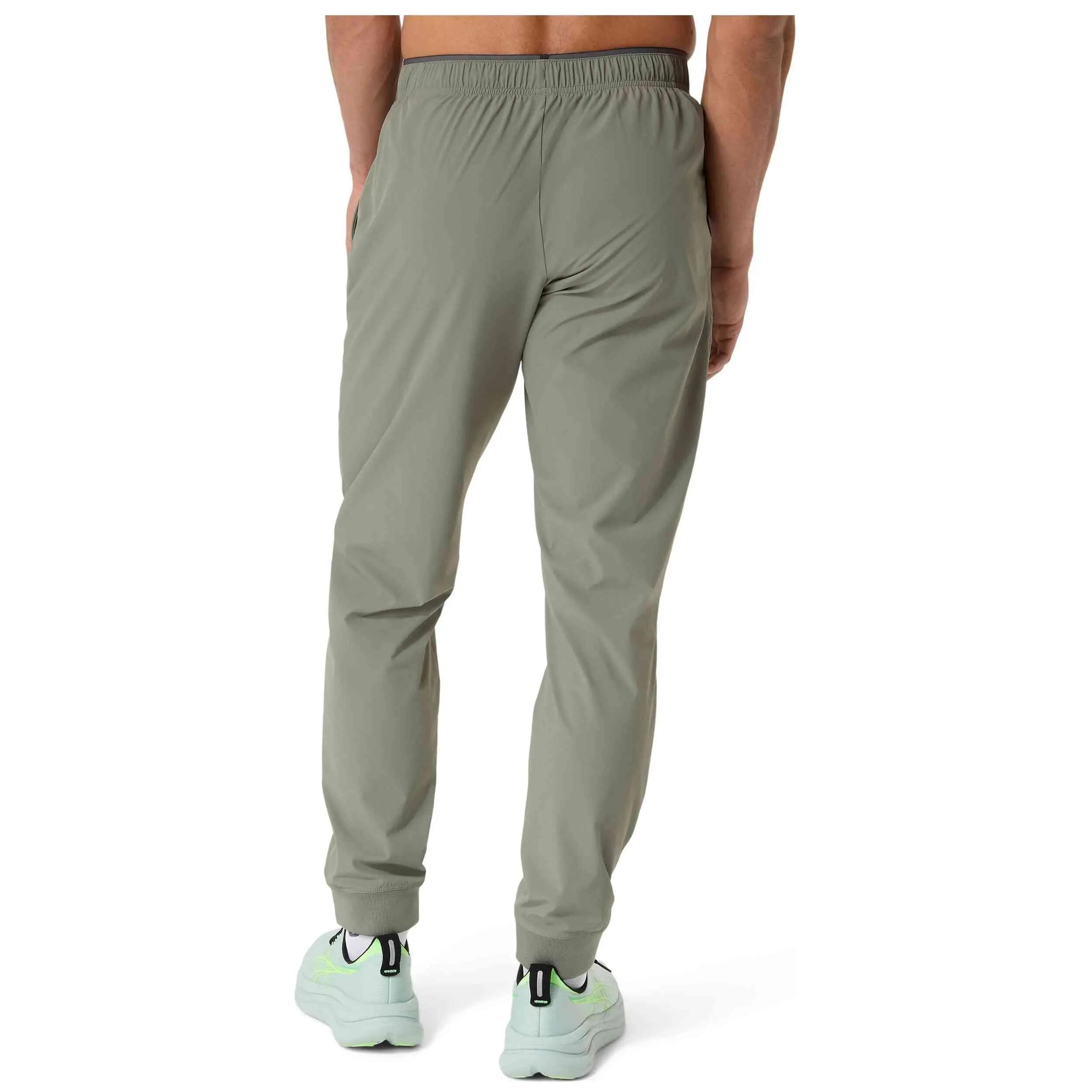 Pantalon de survêtement Asics modèle COMFORT CORE STRETCH WOVEN PANT pour homme 2/5