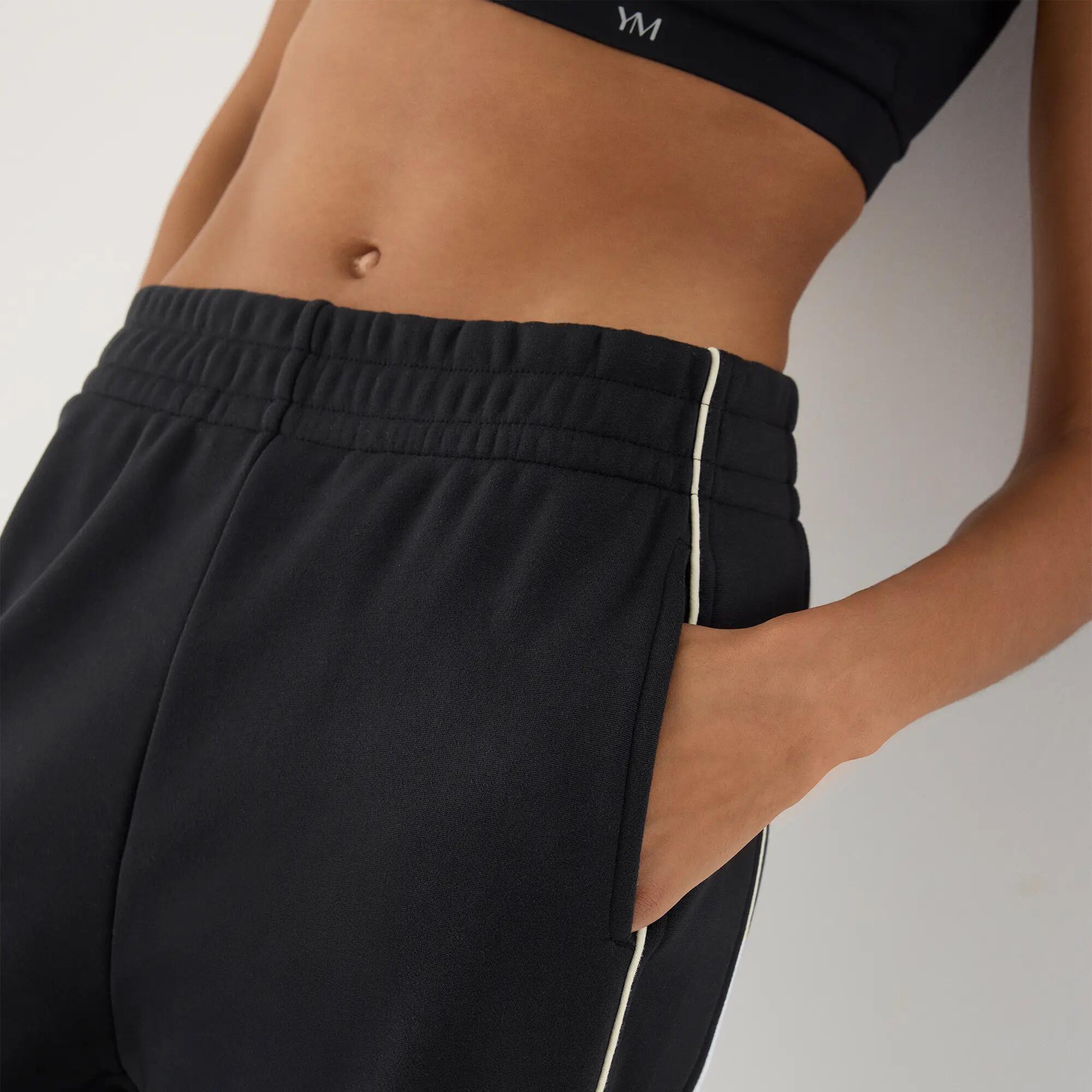 Calças jogger desportivas de mulher cinzento-antracite com bolsos e riscas em co 4/4