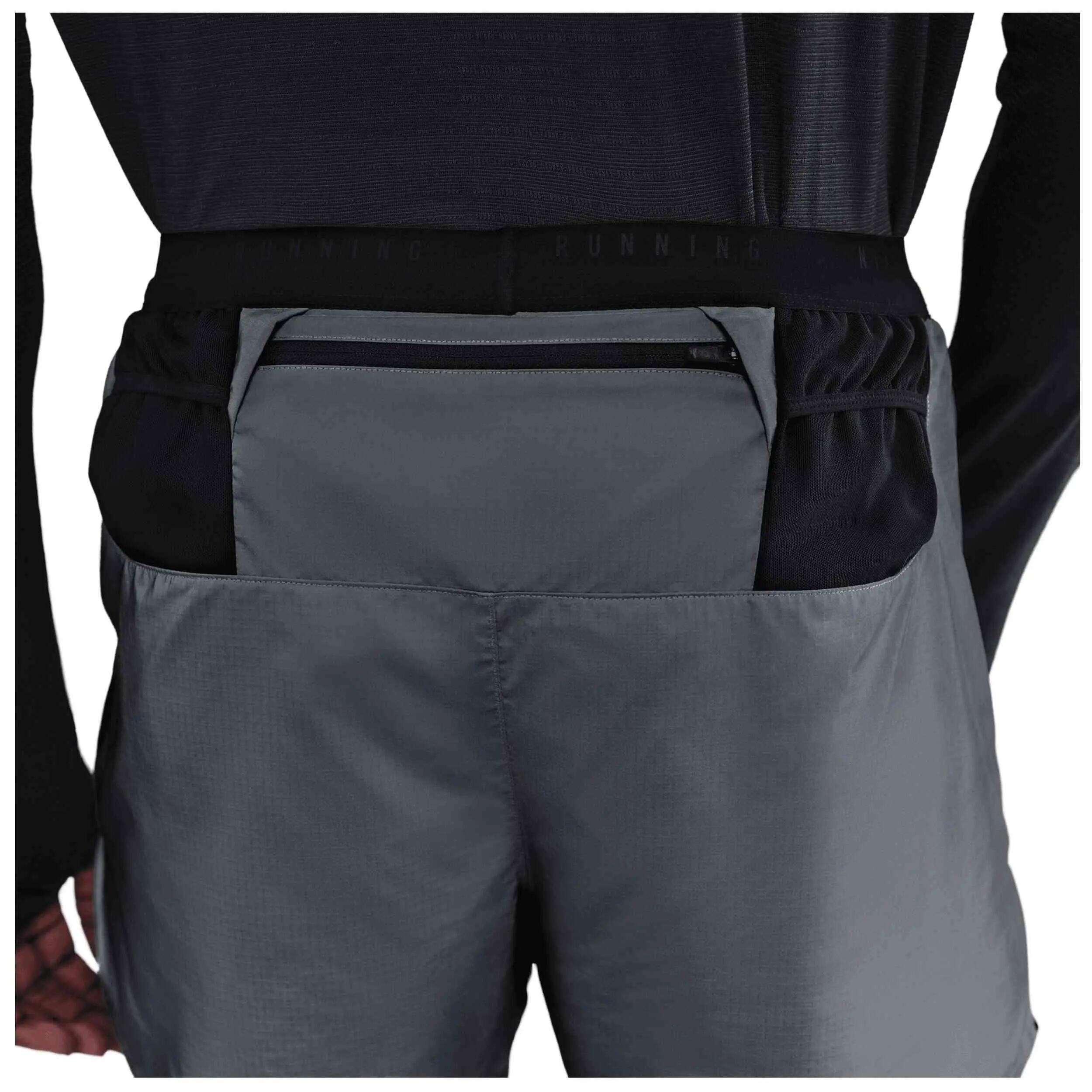 Pantaloncini Nike modello Shorts Nike 4" 2-IN-1 Reflective Running per donne 3/5