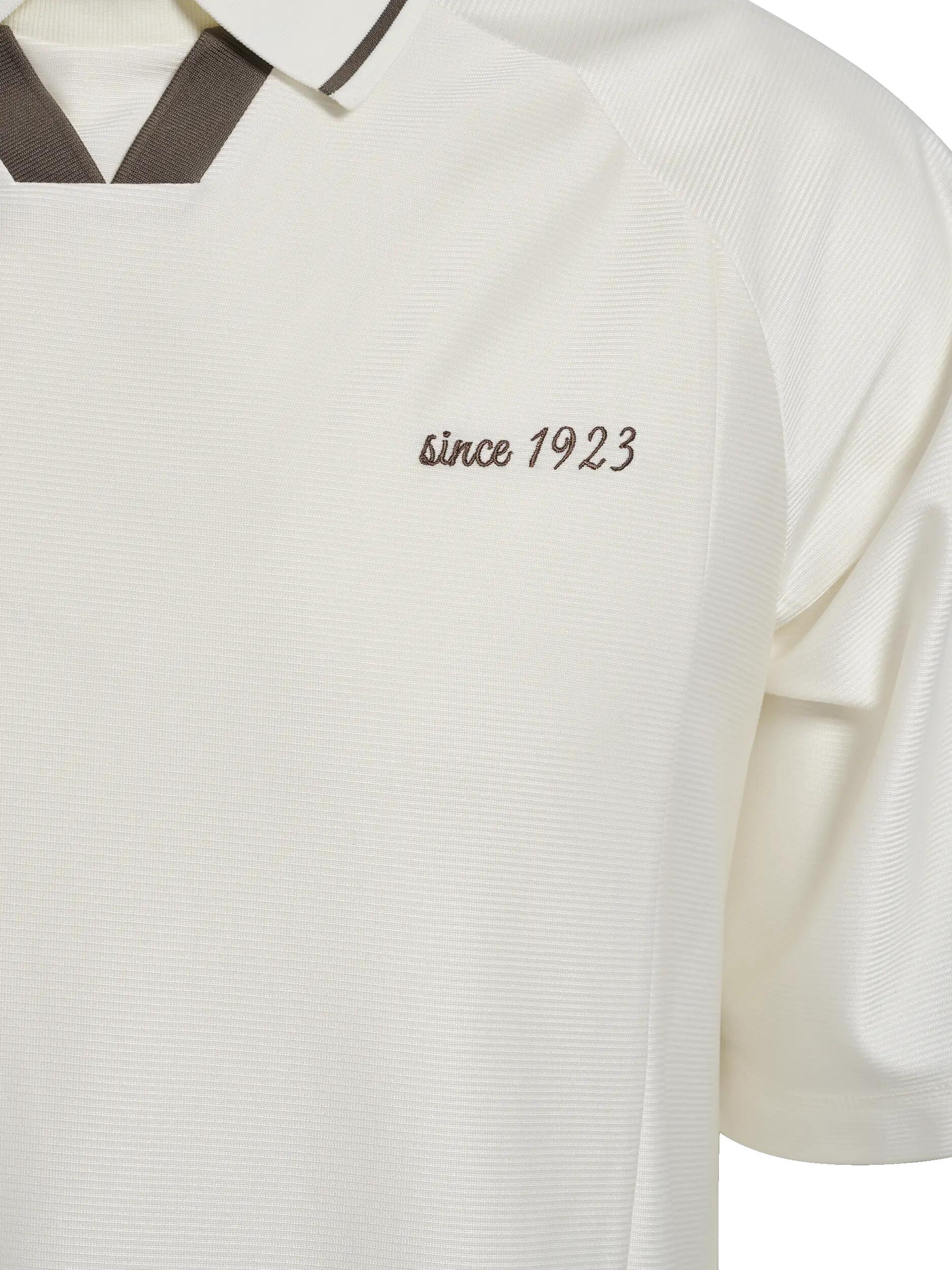 hummel Polo retro manga corta en poliéster – CANNOLI CREAM 4/7