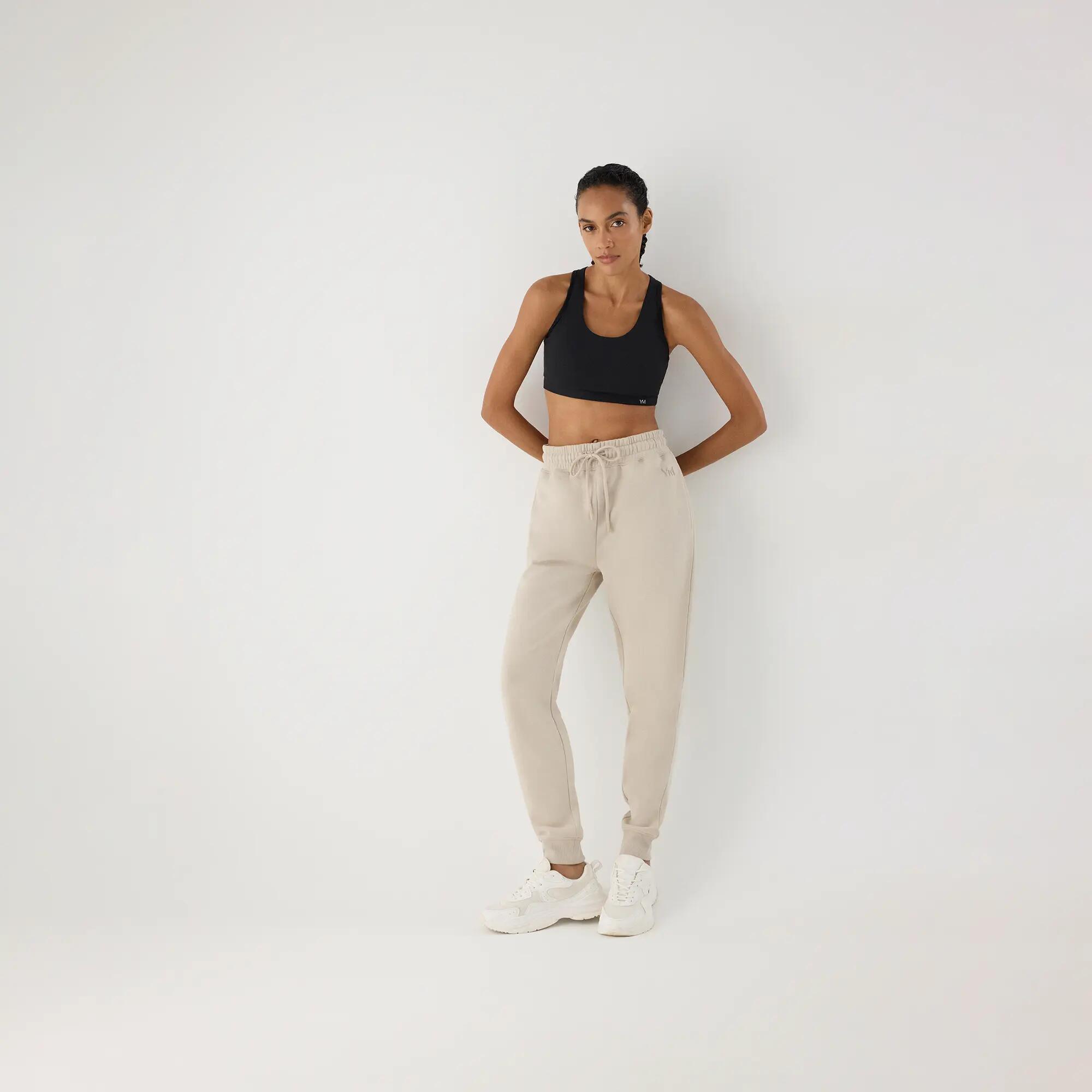 Calças jogger desportivas de mulher bege com cintura ajustável 5/5