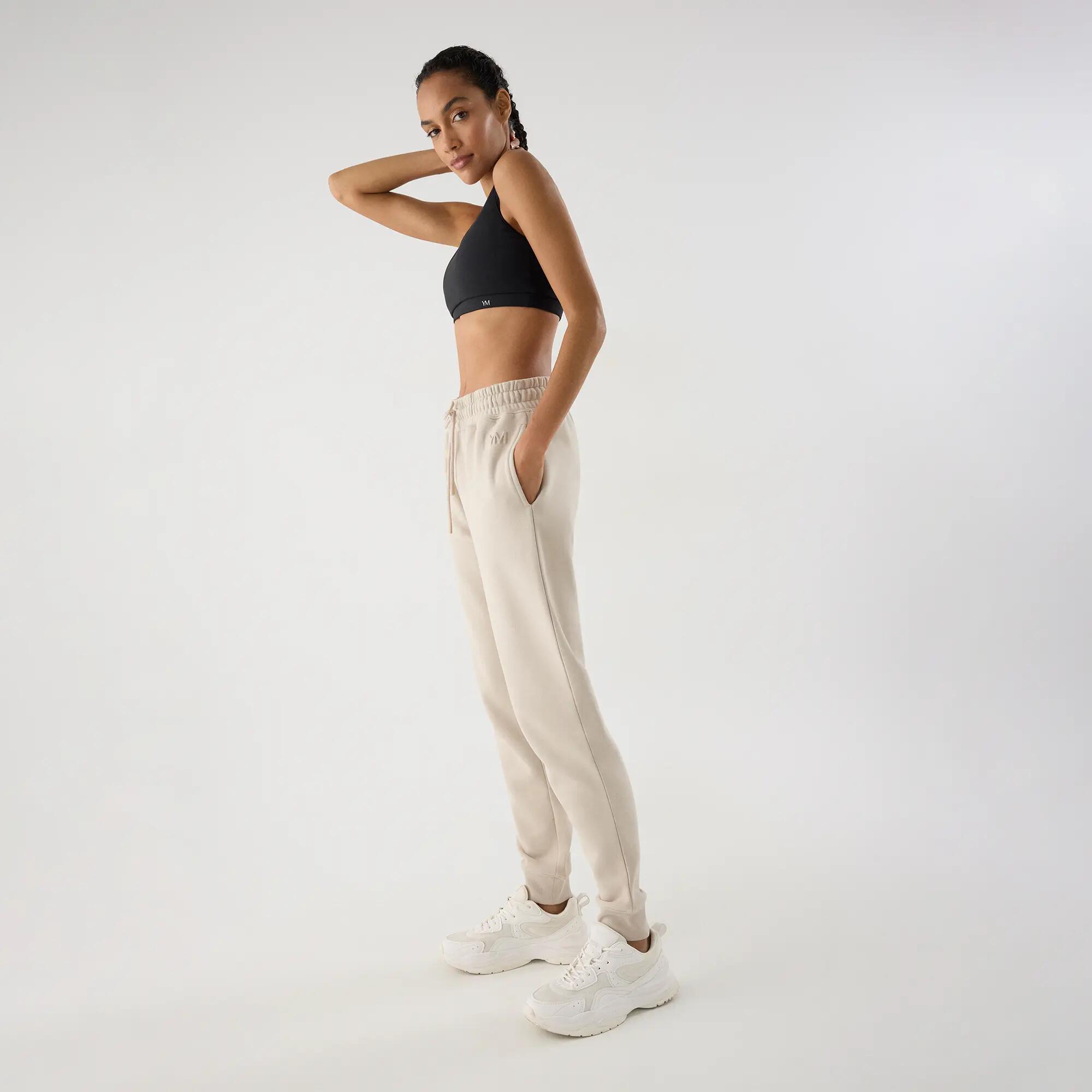 Calças jogger desportivas de mulher bege com cintura ajustável 3/5
